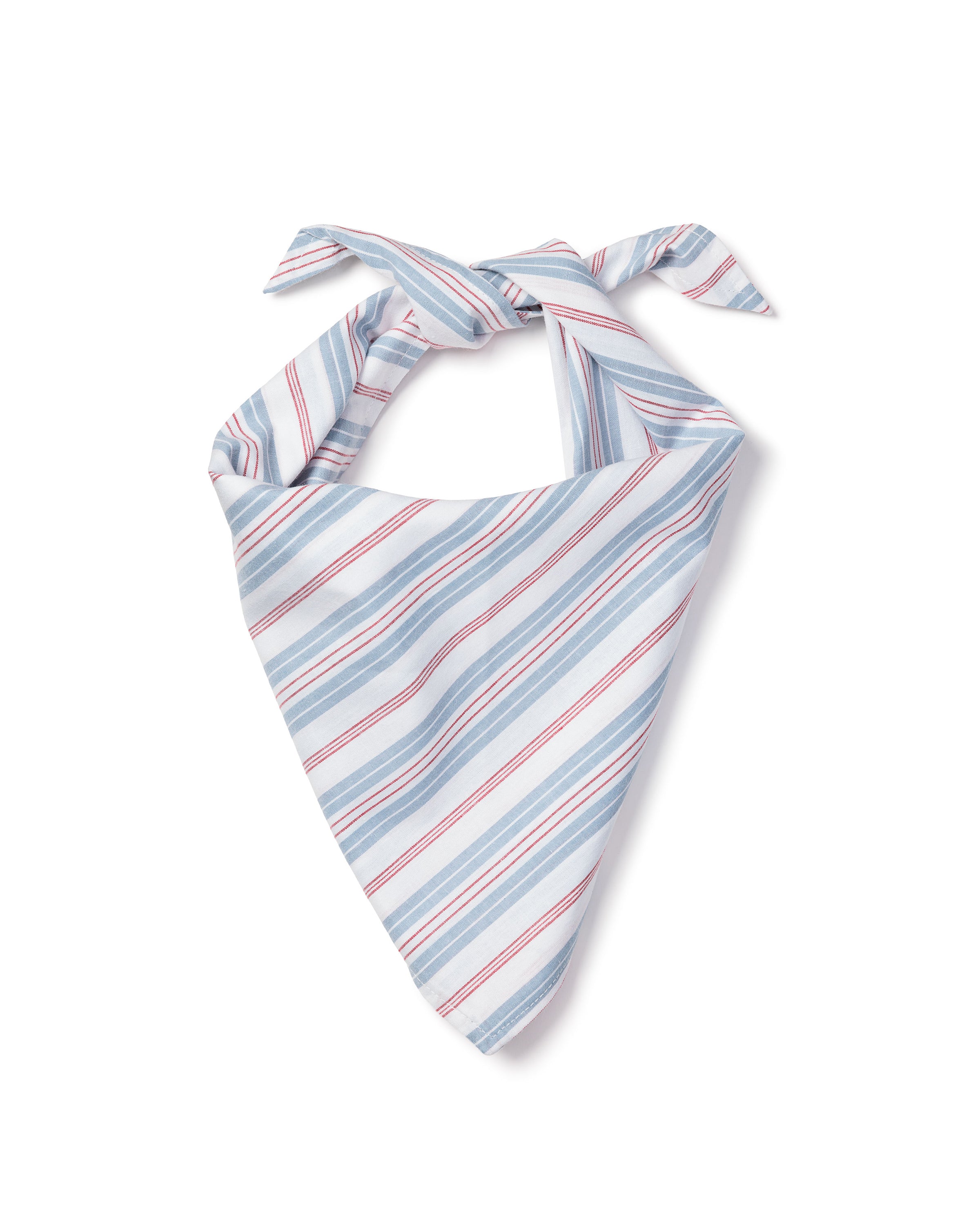 The Twill Dog Bandana in Vintage French Stripes features blue, red, and white diagonal stripes in a triangular shape, tied at the top with two pointed ends on a white background.