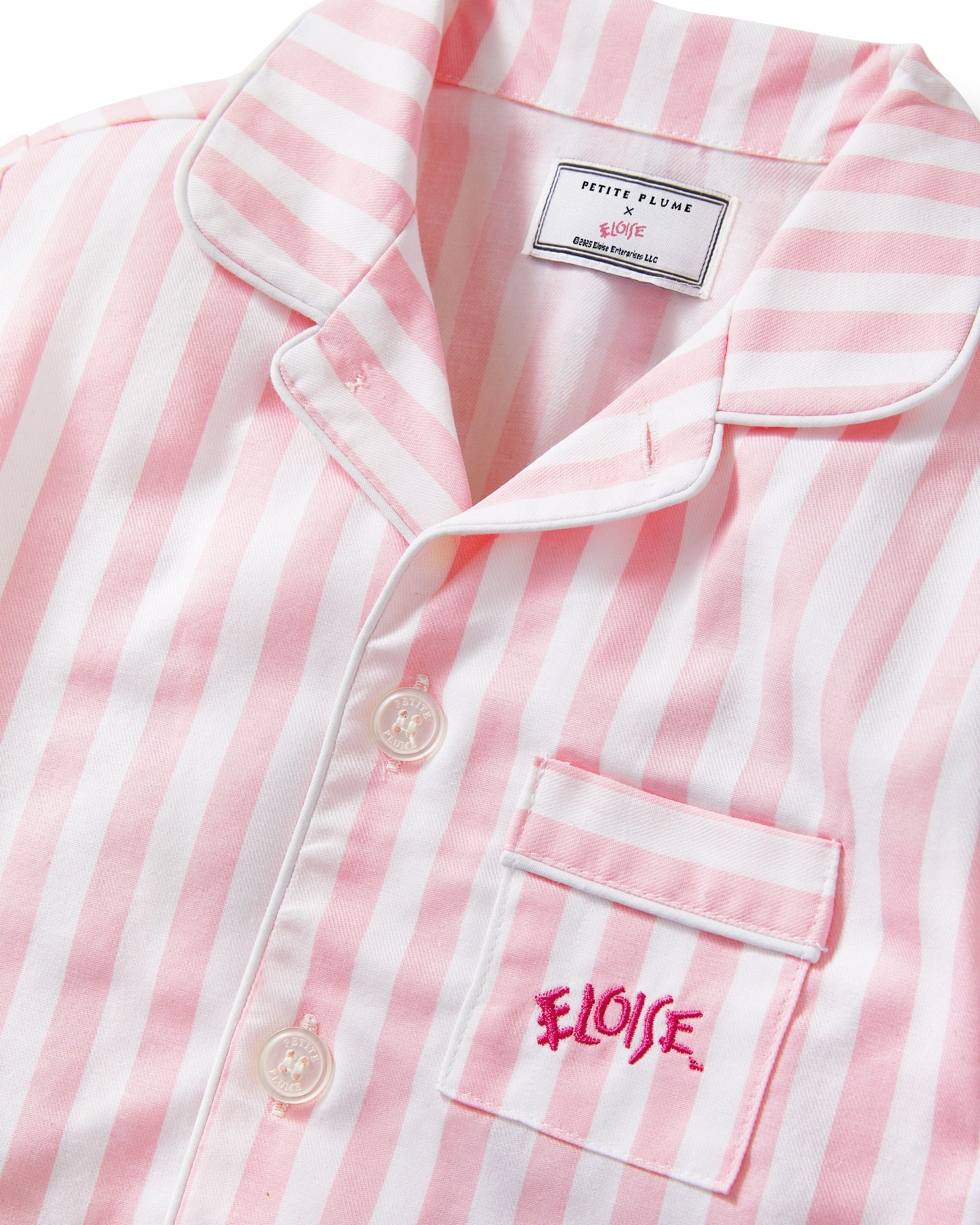 Petite Plume x Eloise Kid's Twill Pajama Set in Eloise Classic Stripe features pink and white stripes.
