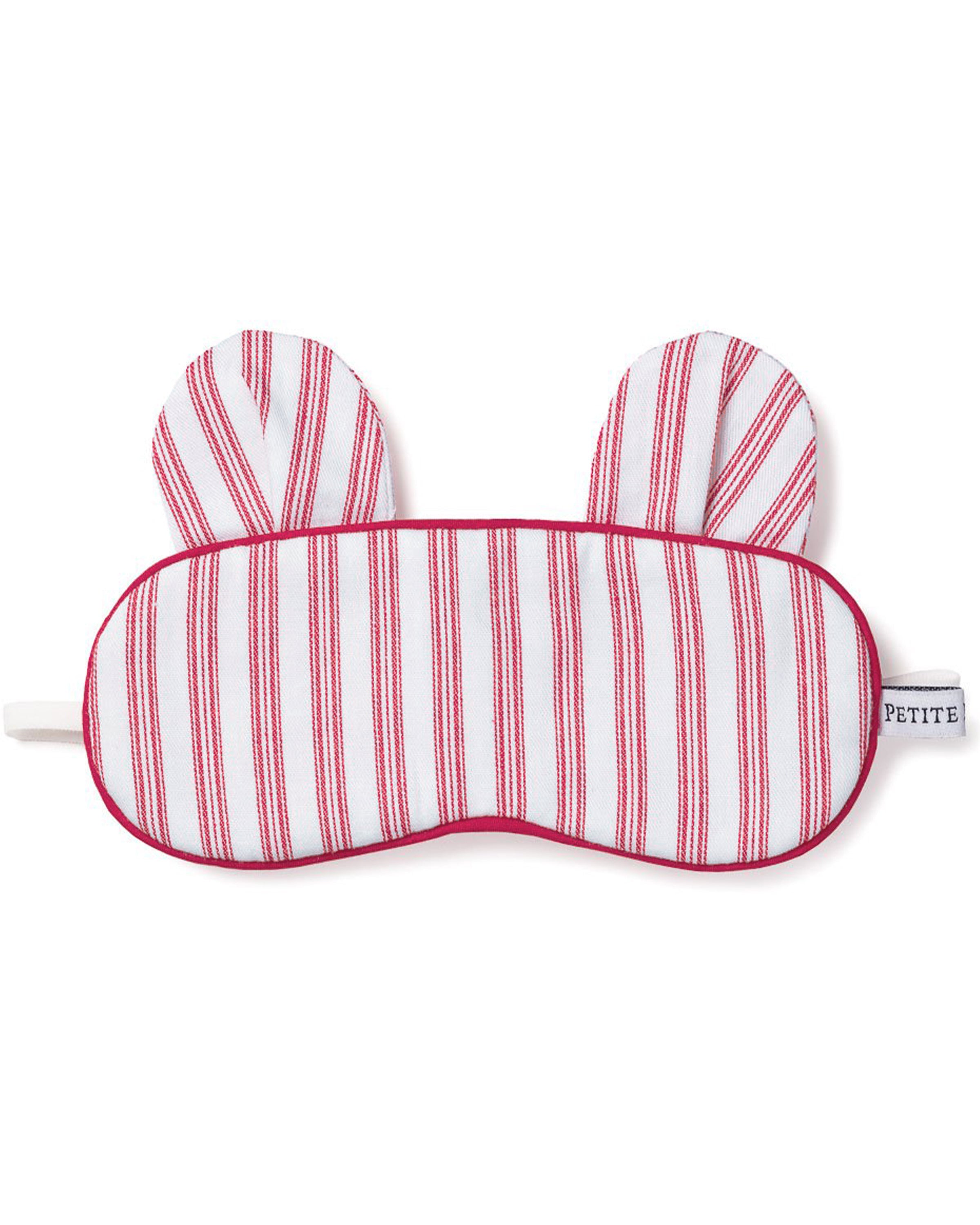 The Kid's Bear-y Sleep Mask in Antique Red Ticking features red and white stripes, two bear ear shapes on top, a white strap, and “PETITE” labeled on the side.