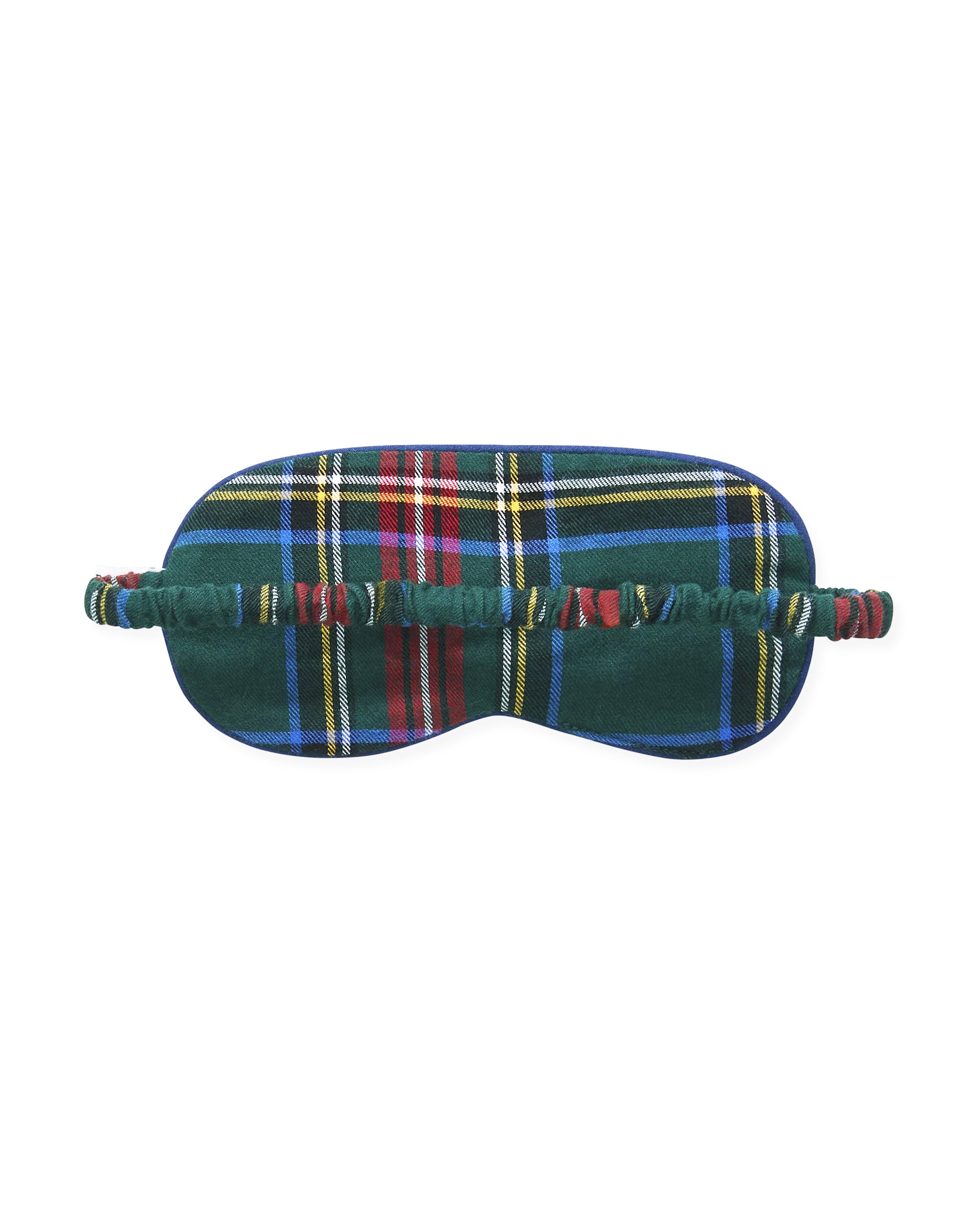 The Kid's Twill Sleep Mask in Kensington Tartan features red, green, yellow, blue, and white plaid, an elastic strap, and a small white PETITE tag on the right side.