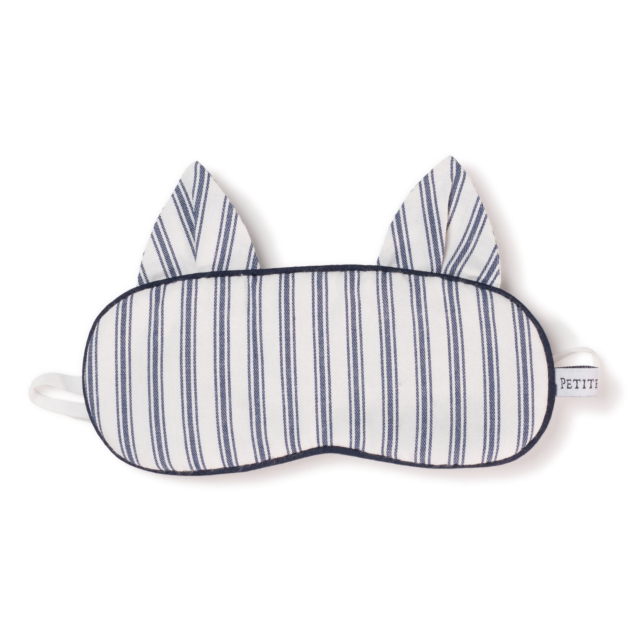 The Kids Twill Kitty Sleep Mask by Petite Plume, in Navy French Ticking, is a whimsical gift. Adorned with cat ears and blue and white stripes, it features a side tag and elastic band for a snug fit. Its perfect for coordinating eye mask sets at bedtime.