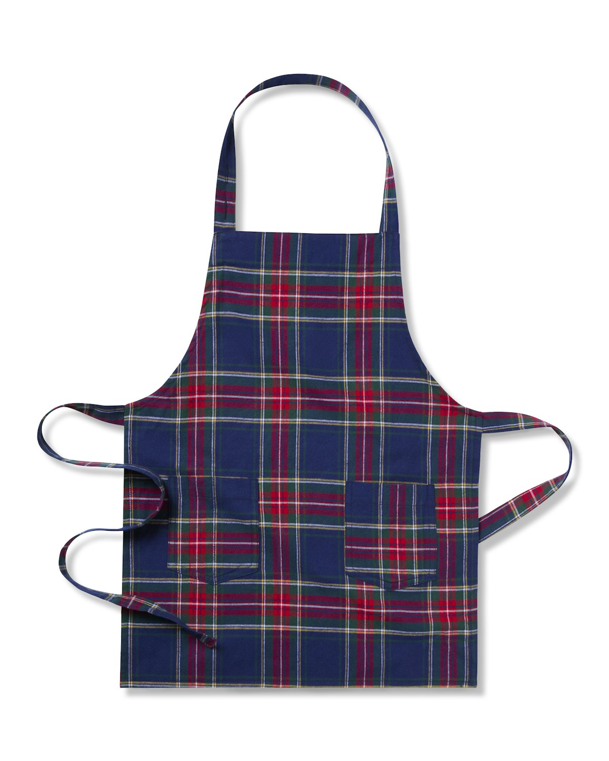 The Kids Apron in Windsor Tartan by Petite Plume is a festive blue apron with red, white, and green plaid, perfect for holiday baking. It features a neck loop, side ties, and a right-side front pocket, making it ideal for aspiring little chefs during the joyful season.