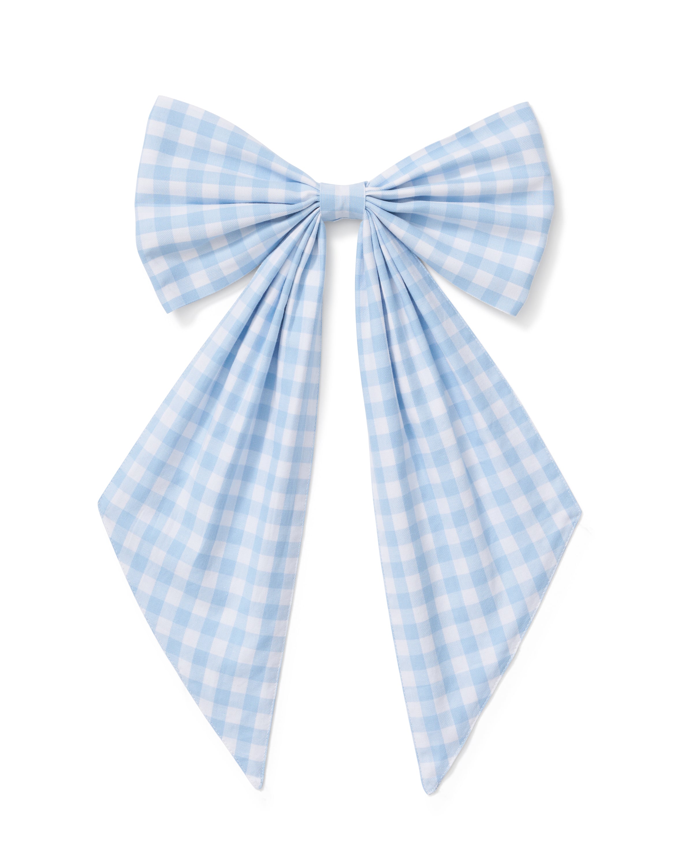 A floral wreath of small white and pink blooms hangs on a beige door, adorned with the Easter Basket and Wreath Bow in Light Blue Gingham featuring long ribbon tails.