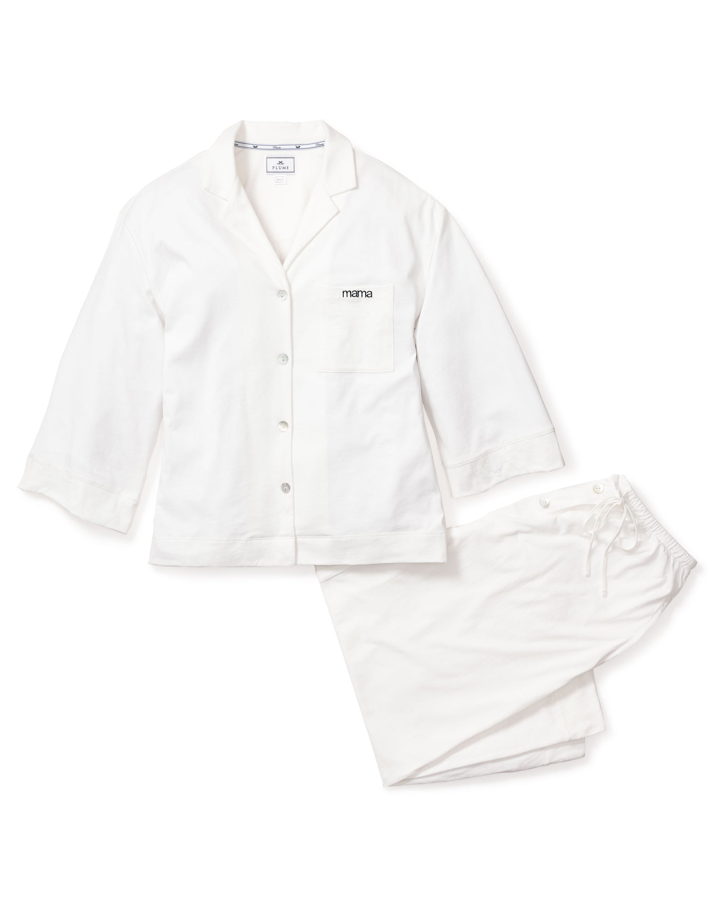 The Olivia Wide Leg Pima Pajama Set by Petite Plume features long sleeves, a notched collar, and mama embroidered on a chest pocket. The matching pants have a drawstring waist, making them perfect for Mothers Day and crafted from luxurious Peruvian Pima cotton.
