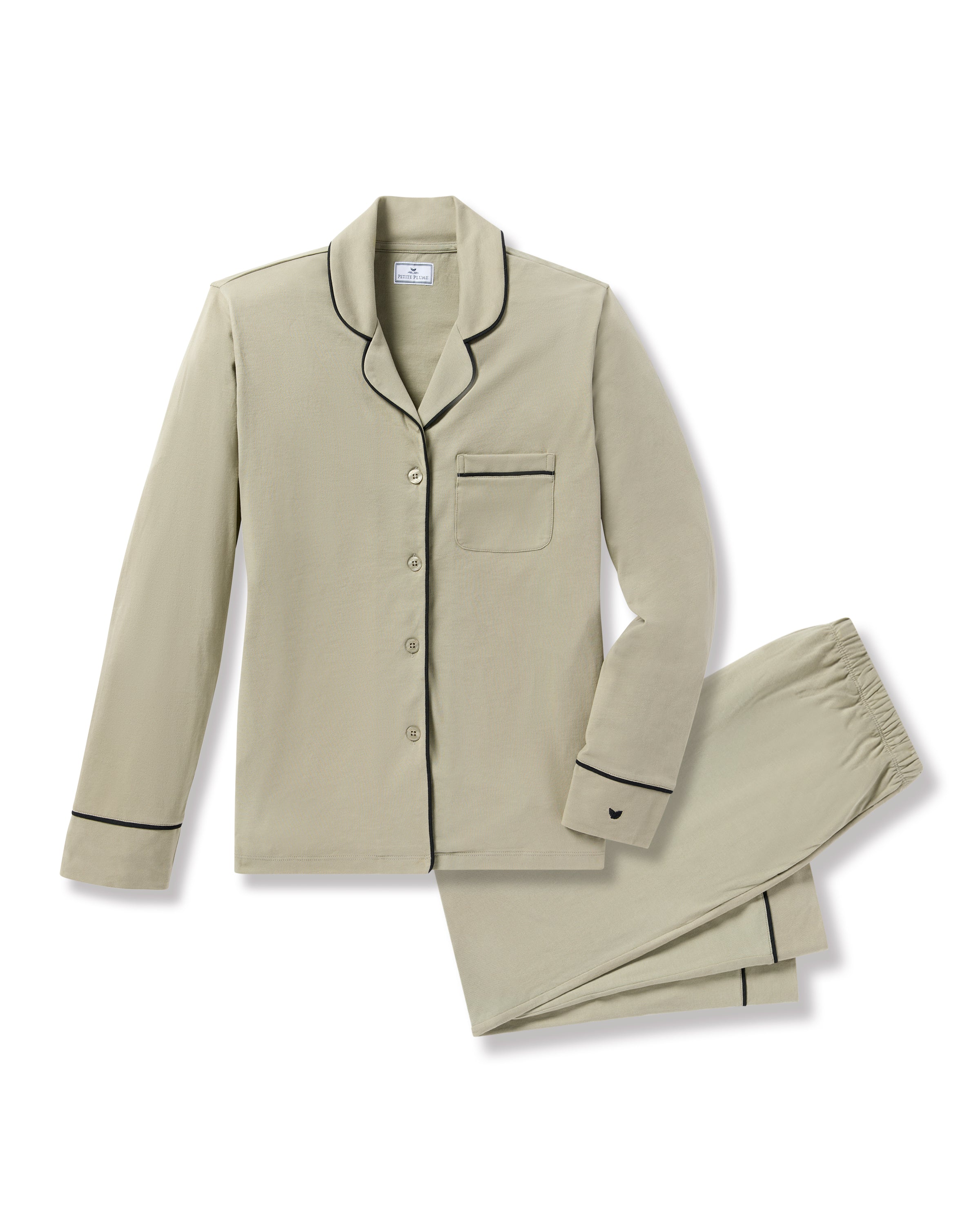 The Petite Plume x Parachute Womens Pima Pajama Set in Moss, made from buttery soft Peruvian Pima cotton, includes a long-sleeve button-up shirt with black piping and a chest pocket, plus matching pants with an elastic waistband, displayed against a white background.