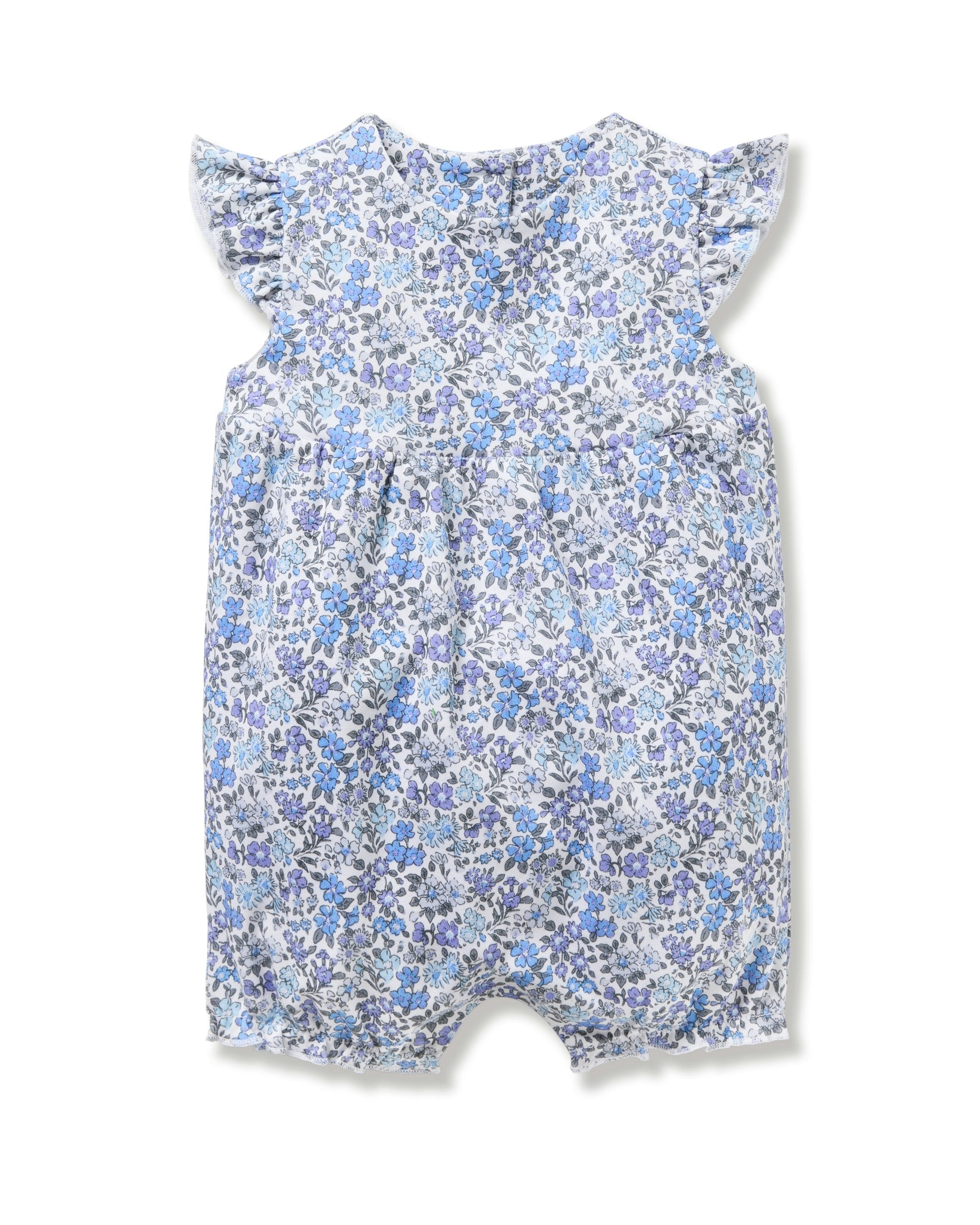 Floral-patterned baby romper on a white background