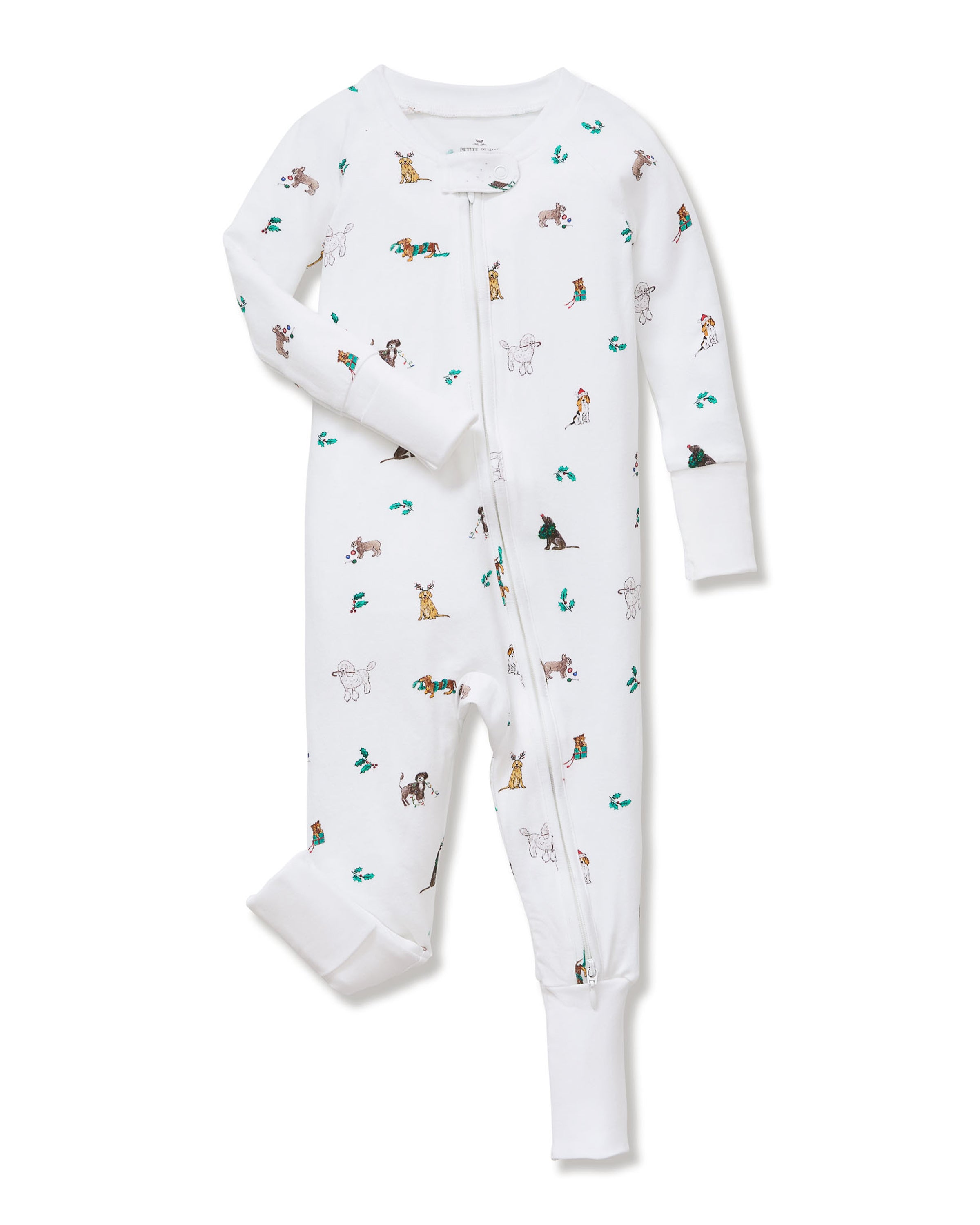 The Baby's Pima Peekaboo Romper in Jingle Paws is a white, long-sleeve onesie with a front zipper, decorated with colorful dogs and green bones. The left leg appears slightly folded over.