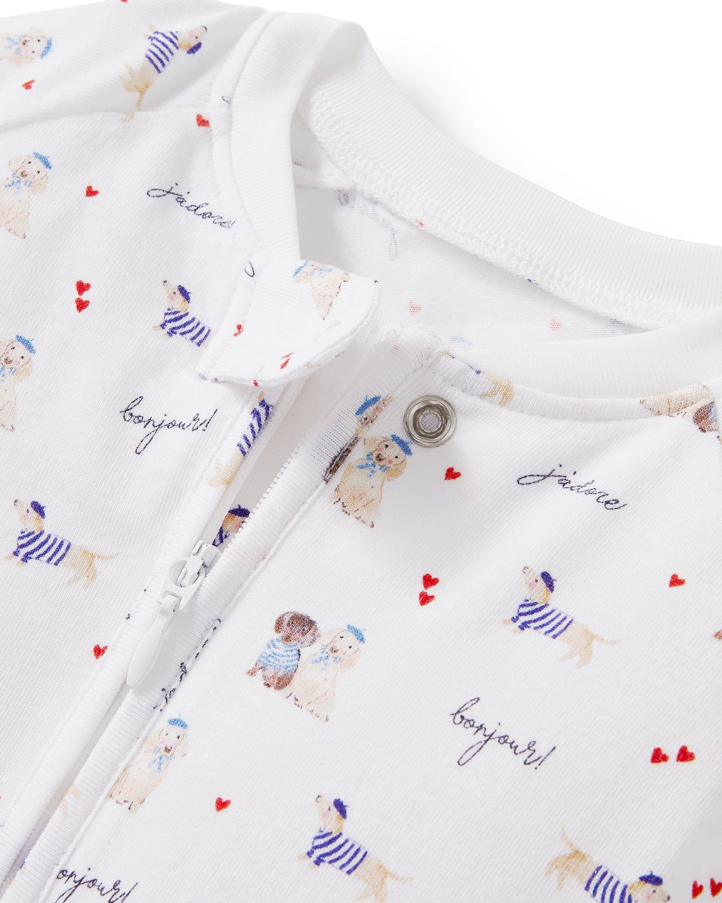 The Baby's Pima Peekaboo Romper in Le Woof is a white long-sleeve, full-length onesie with animal and balloon prints, front zipper, and cuffed sleeves and ankles.