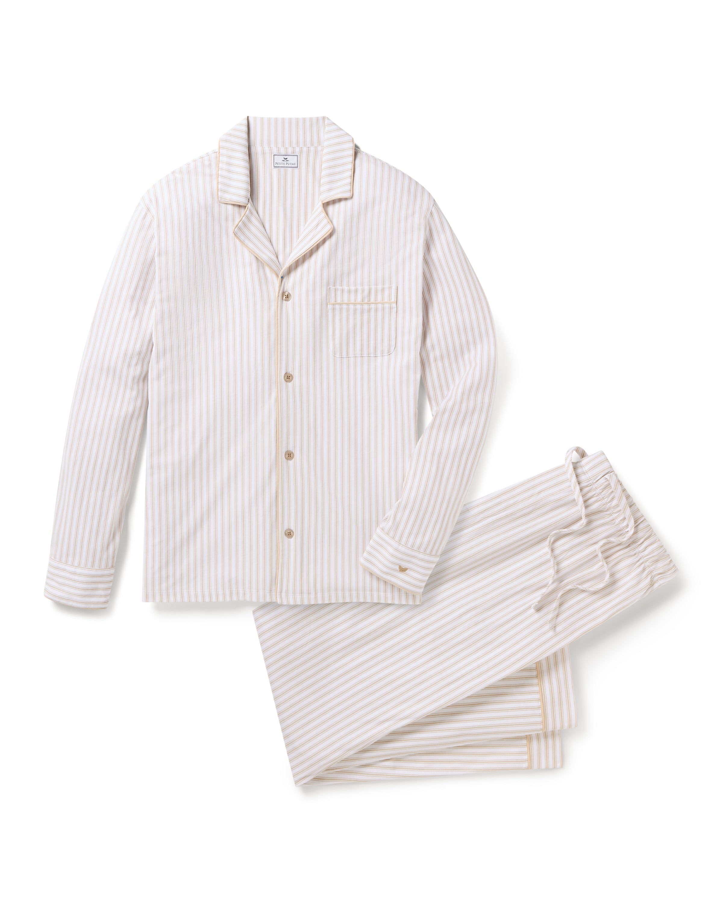 The Men's Pima Pajama Set in Camel Ticking features beige and white stripes, a button-up long-sleeve top with a chest pocket, and matching drawstring pants, displayed flat on a white background.