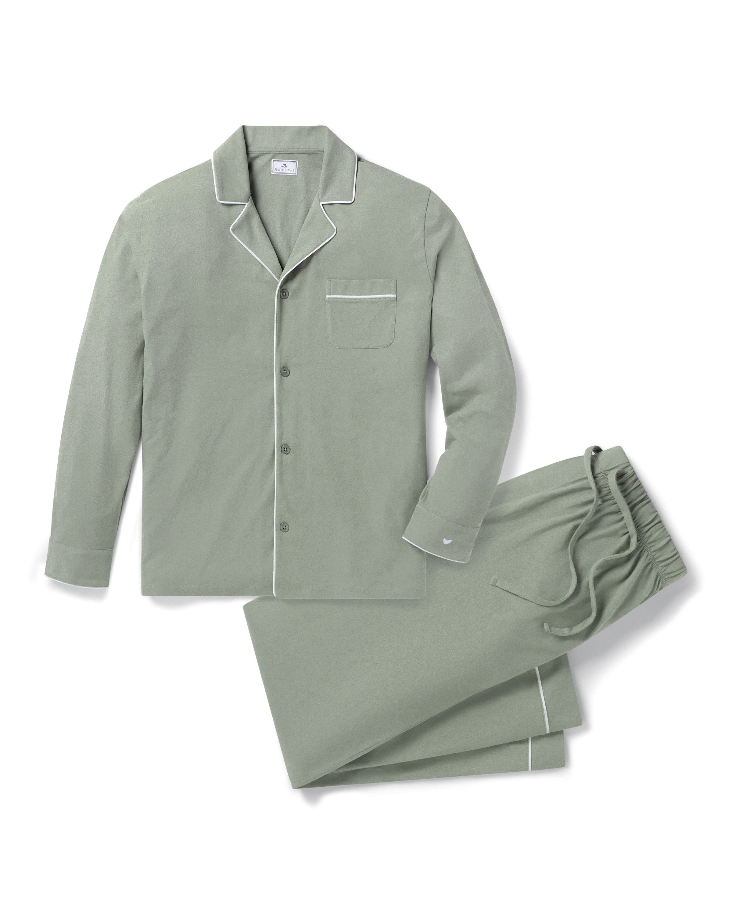 Men’s Pima Pajama Set in Sage: long-sleeve button-up top with white piping and chest pocket, plus matching drawstring pants, both laid flat on a white background.