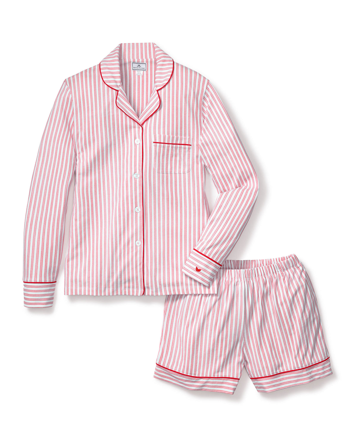 Close-up of Petite Plumes Womens Pima Long Sleeve Short Set in Antique Red Ticking. Crafted from luxurious Pima cotton with vertical red and white stripes, it features tailored piping on the collar and pocket, and a single white button exemplifying sleepwear elegance.