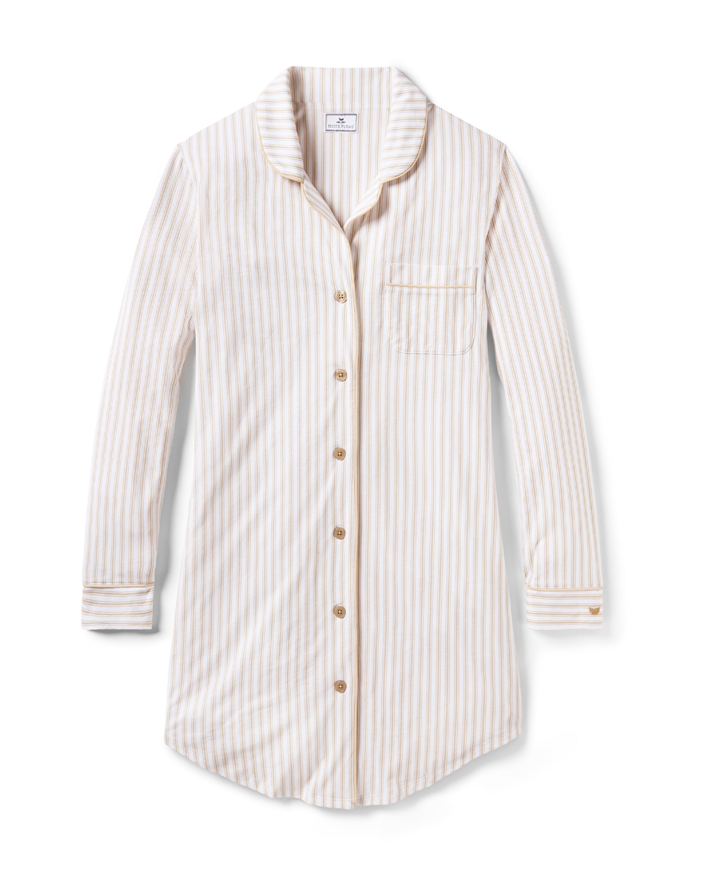 The Women's Pima Nightshirt in Camel Ticking features beige and white vertical stripes, long sleeves, a knee-length cut, button-down front, chest pocket, and collar; shown laid flat on a white background.