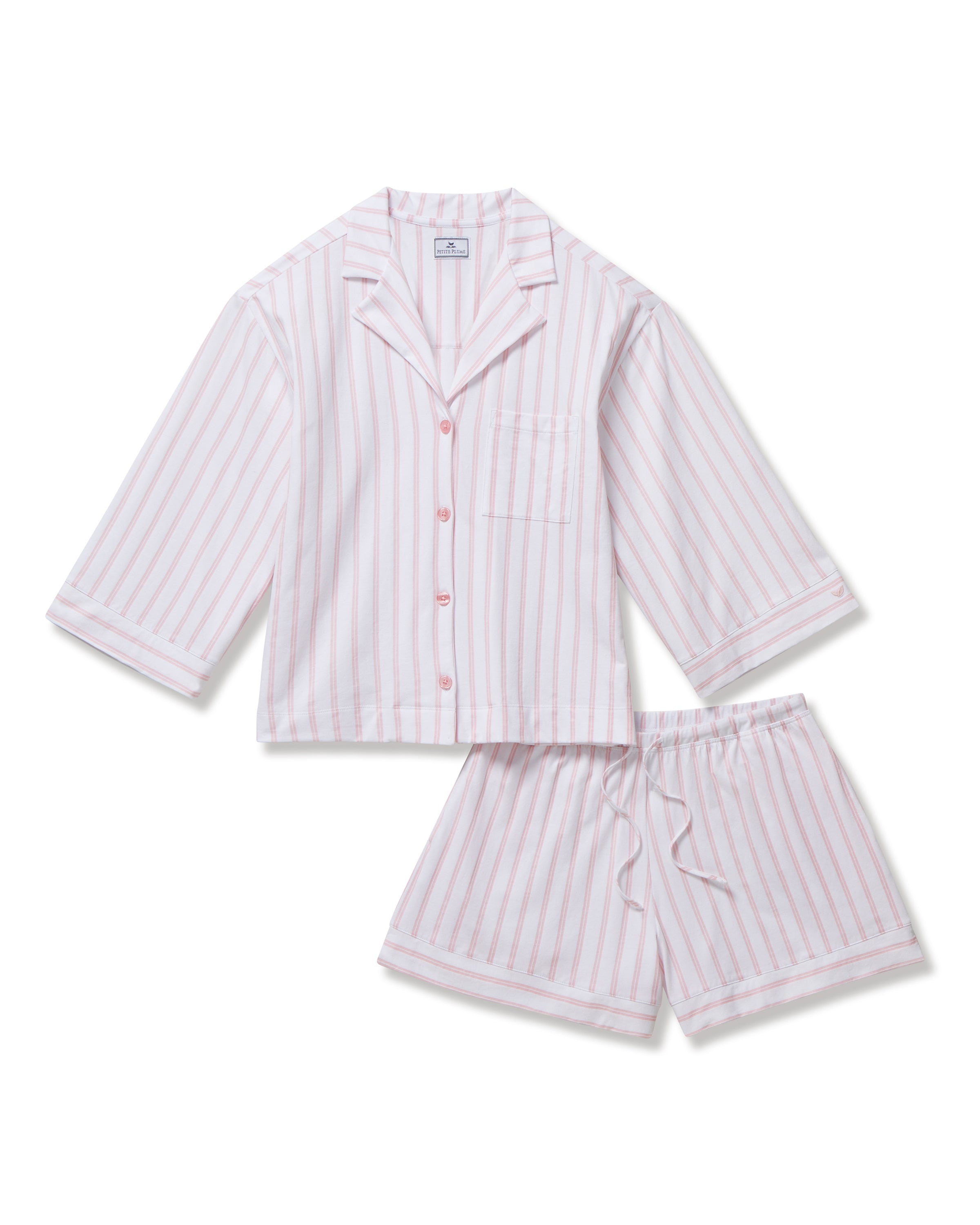 The Olivia Pima Short Set in Pink Stripe features a two-piece pajama set with white and pink vertical stripes, a long-sleeve button-up top with chest pocket, and matching drawstring shorts.