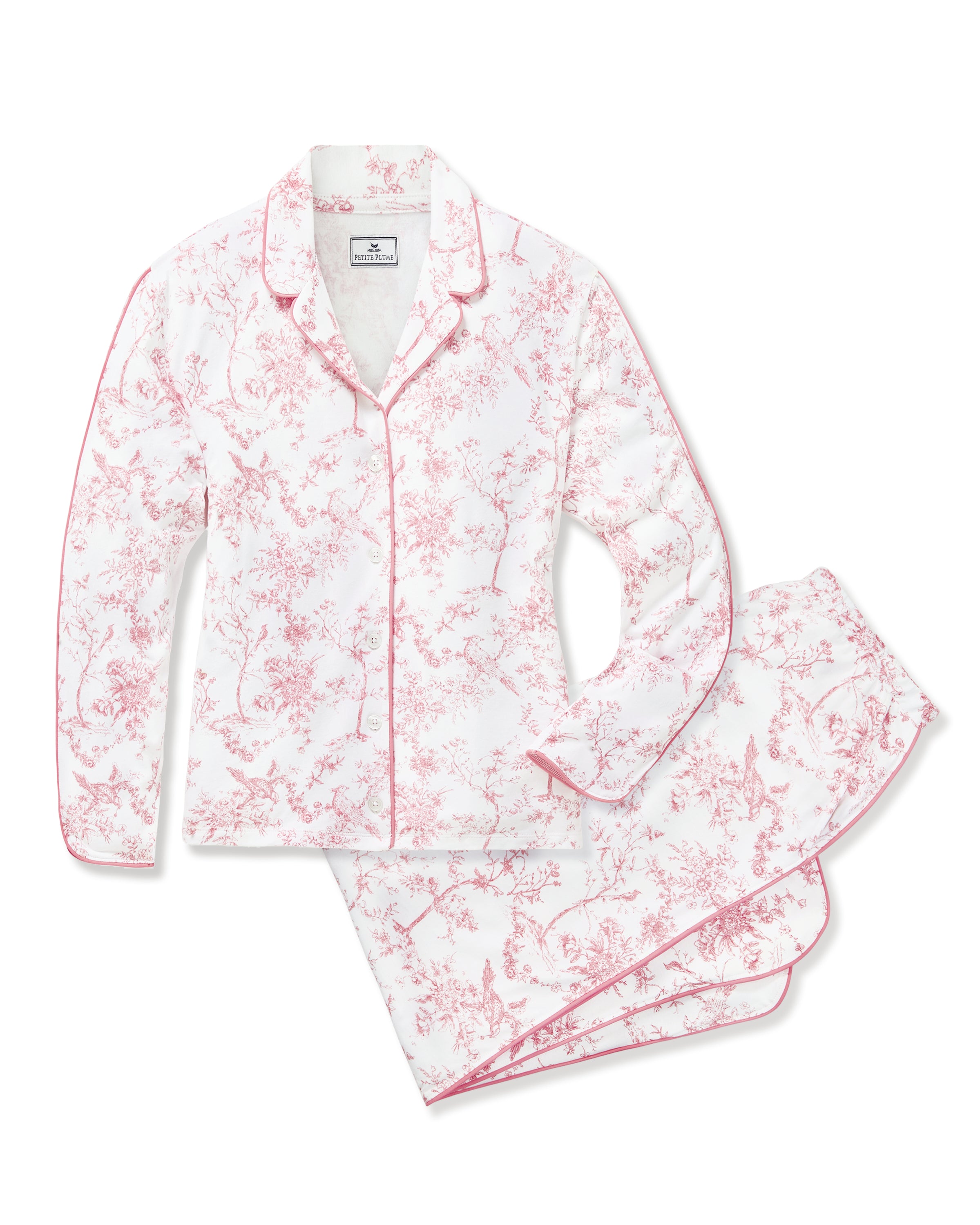 The Margaux Pima Pajama Set in Pink Timeless Toile features long sleeves, soft white fabric with a pink floral toile pattern, and pink piping along the edges and collar.
