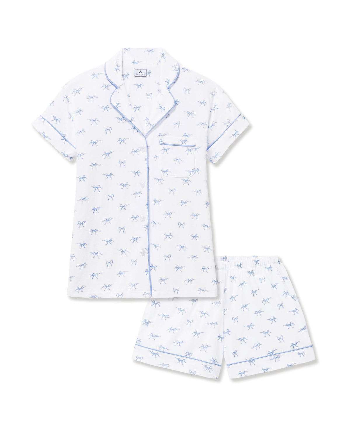 Women's Pima Short Sleeve Short Set in Something Blue Bows features a collared button-up top with chest pocket and matching elastic-waist shorts, both adorned with all-over blue bow print and contrast piping.