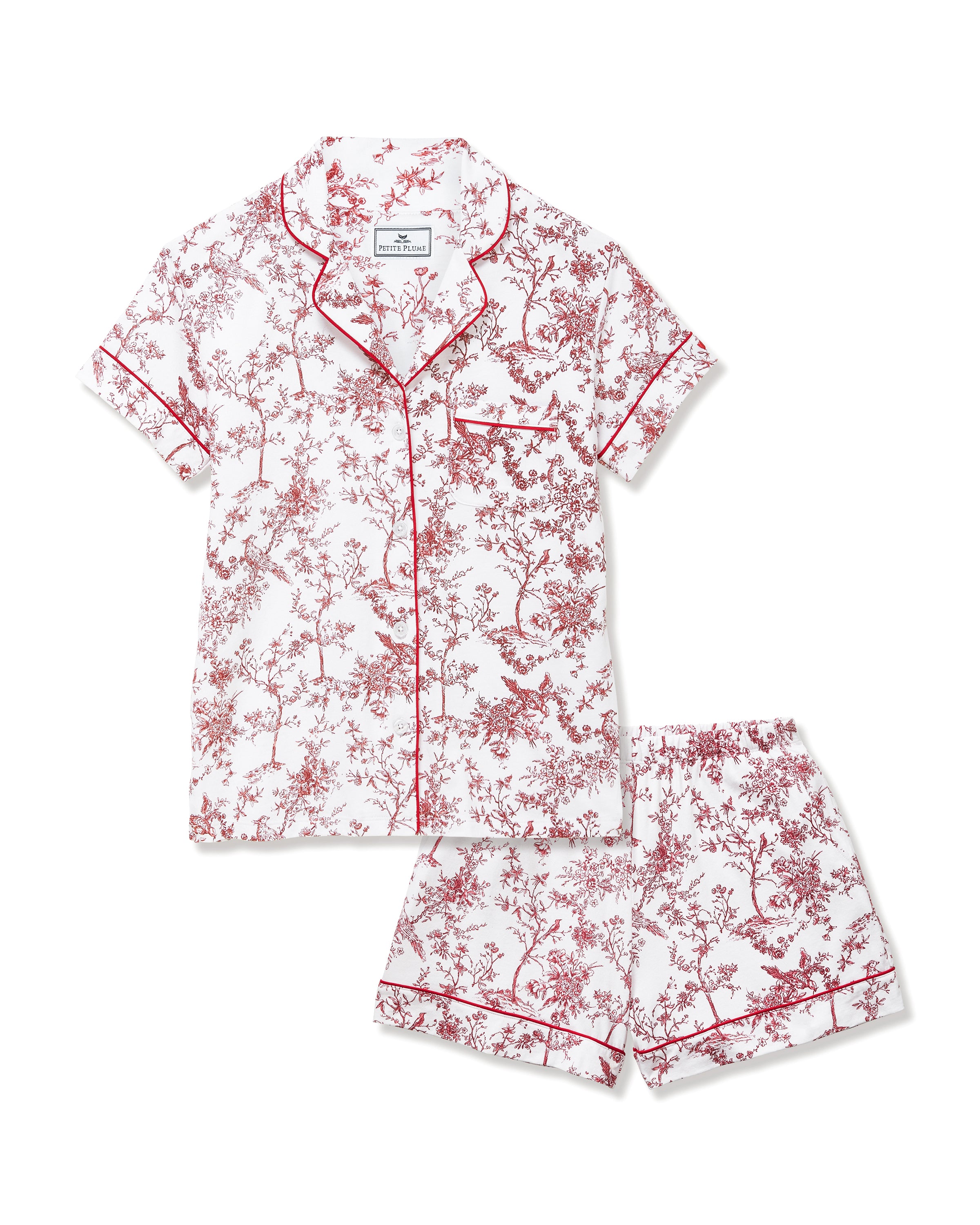 Women's Pima Short Sleeve Short Set in Red Timeless Toile: a short-sleeve pajama set with a collared button-up top and shorts, adorned with a red floral print on white fabric and finished with red piping.
