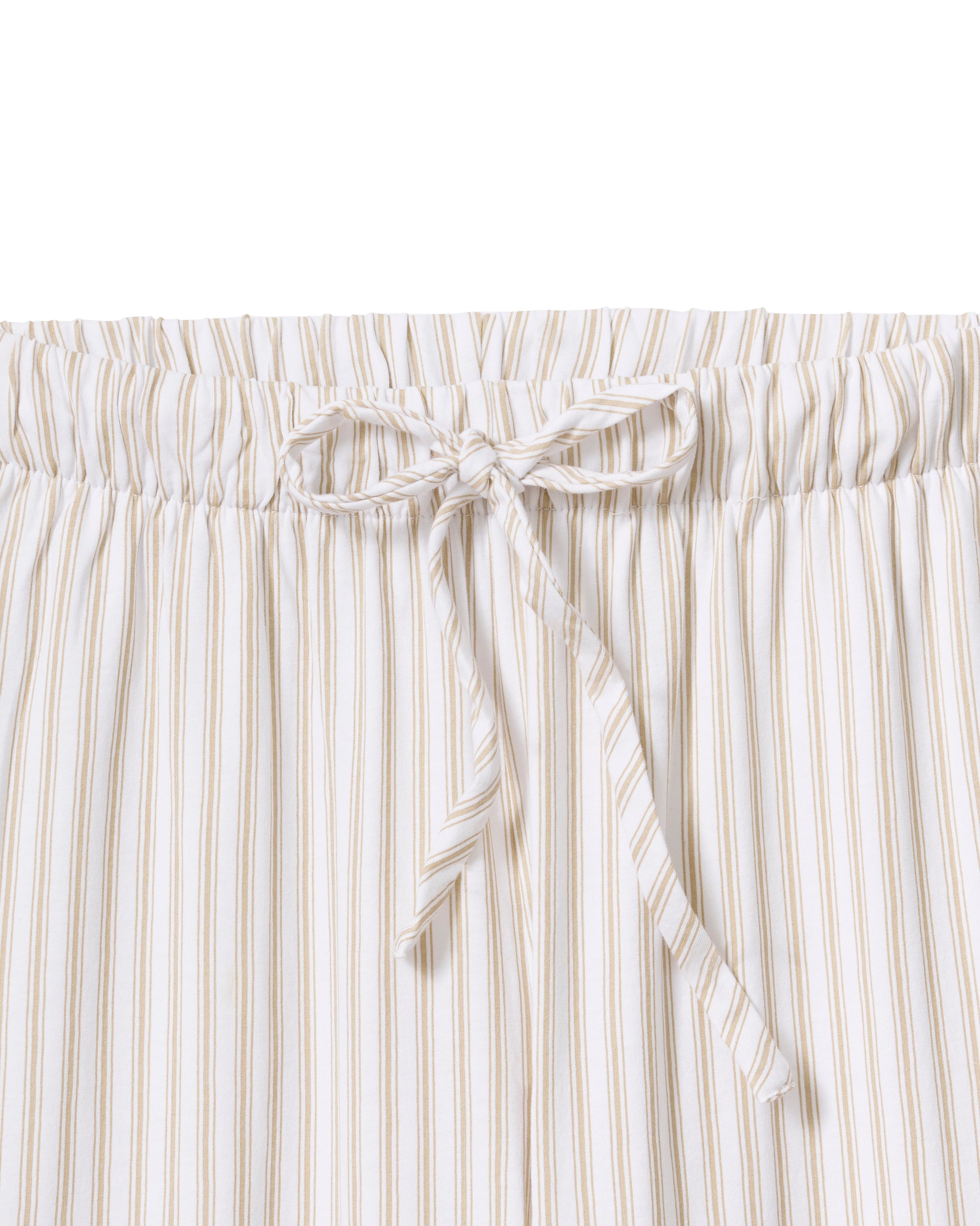 The Olivia Wide Leg Pima Pajama Set in Camel Ticking features light-colored, long-sleeve striped pajamas with brown buttons and matching drawstring pants, displayed flat on a white background.