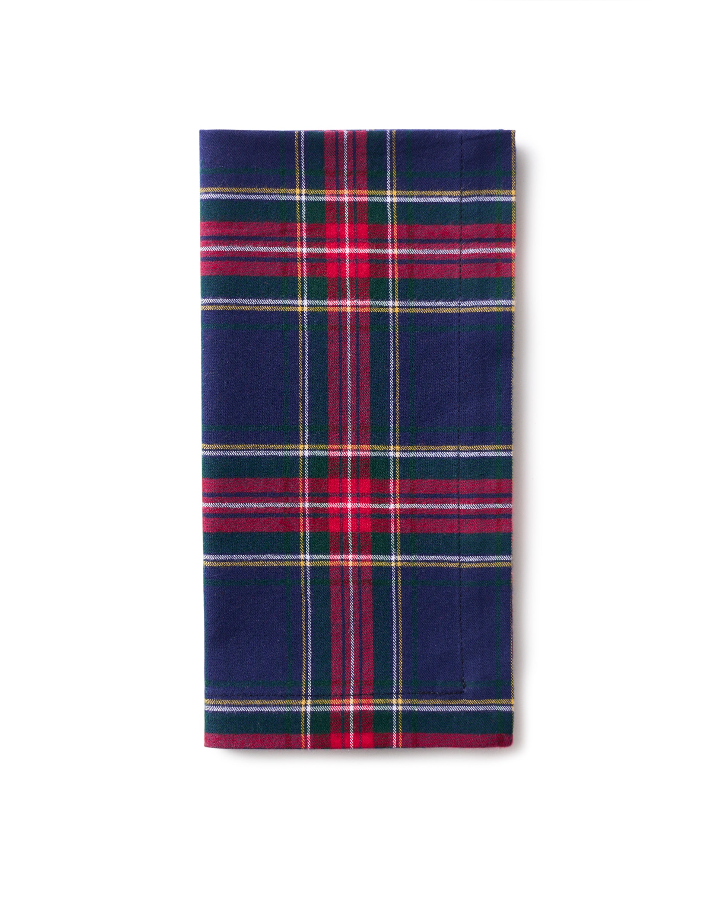The Signature Twill Napkins by Petite Plume feature a Windsor Tartan pattern in red, green, and blue on a white background. Made from 100% cotton, theyre perfect for adding charm to your festive tablescape and are ideal for enhancing any table linens collection.