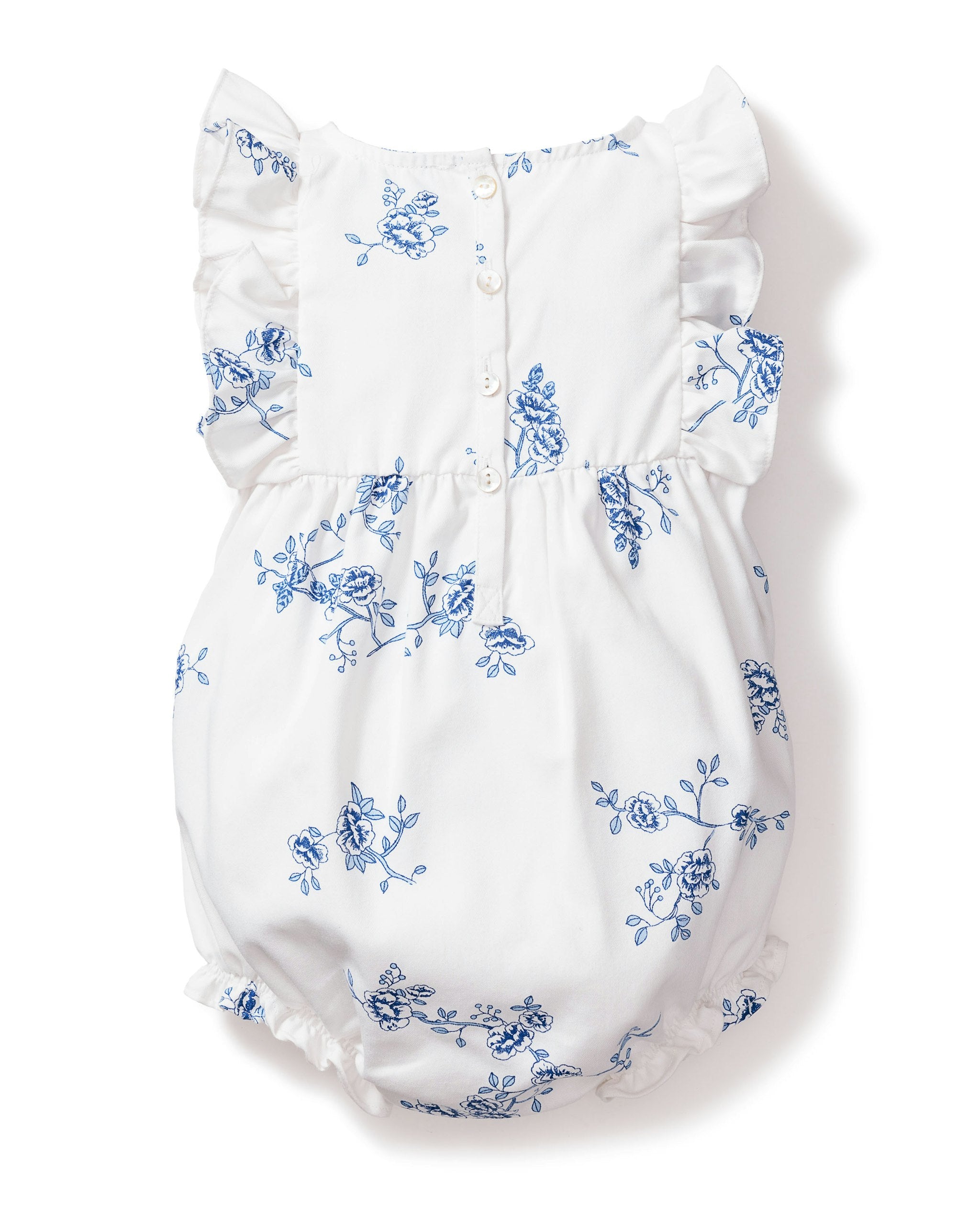 White baby romper with blue floral patterns on a plain background