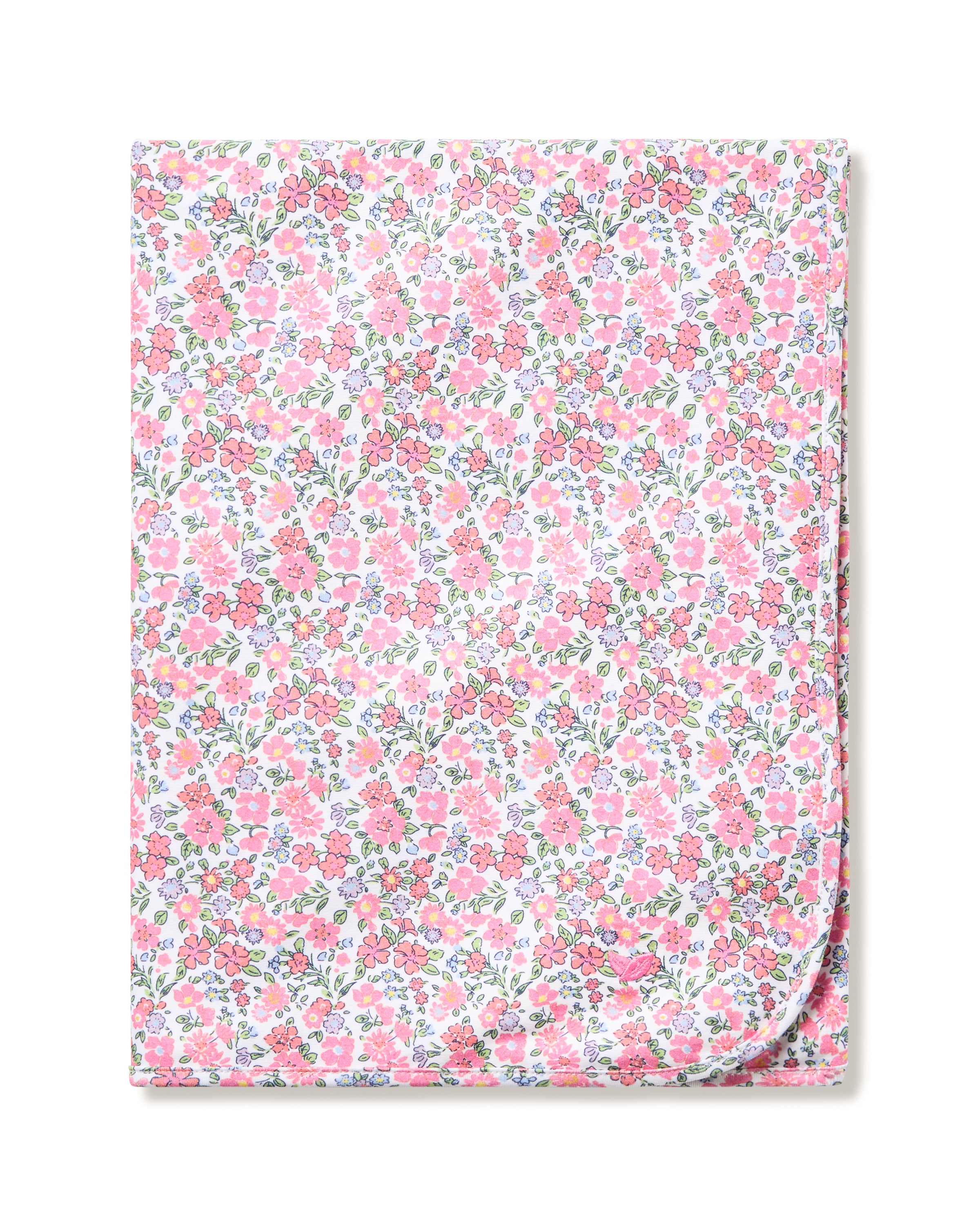 The Petite Plume Pima Baby Blanket in Fleurs de Rose showcases a vibrant floral pattern with pink, orange, and blue flowers on a white background, crafted from soft and cozy Pima cotton.