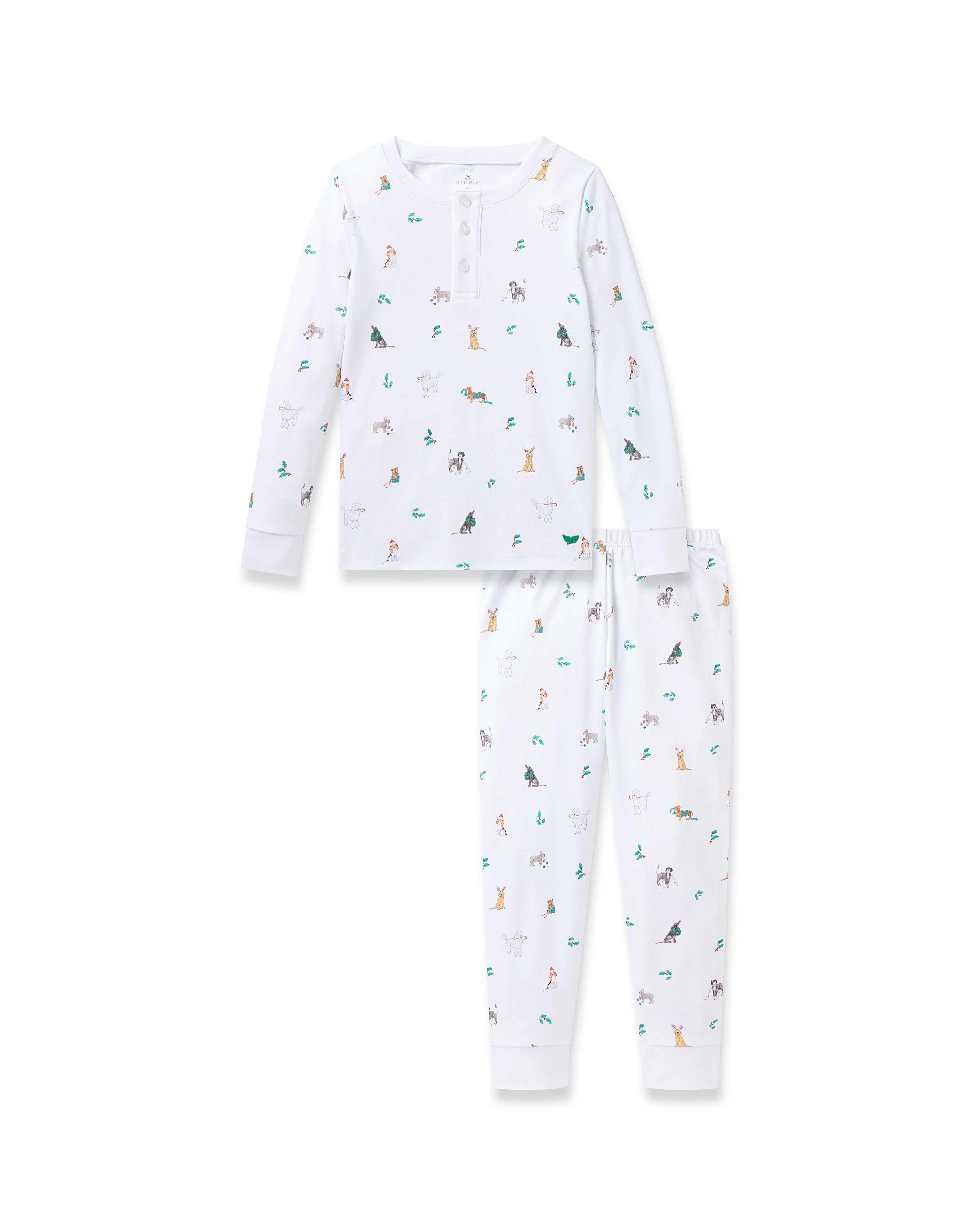 Enjoy the Kids Pima Snug Fit Pajama Set in Jingle Paws by Petite Plume, featuring vibrant animal prints and a button-up neckline. Made from soft Pima cotton, this white long-sleeve set ensures a cozy nights sleep.