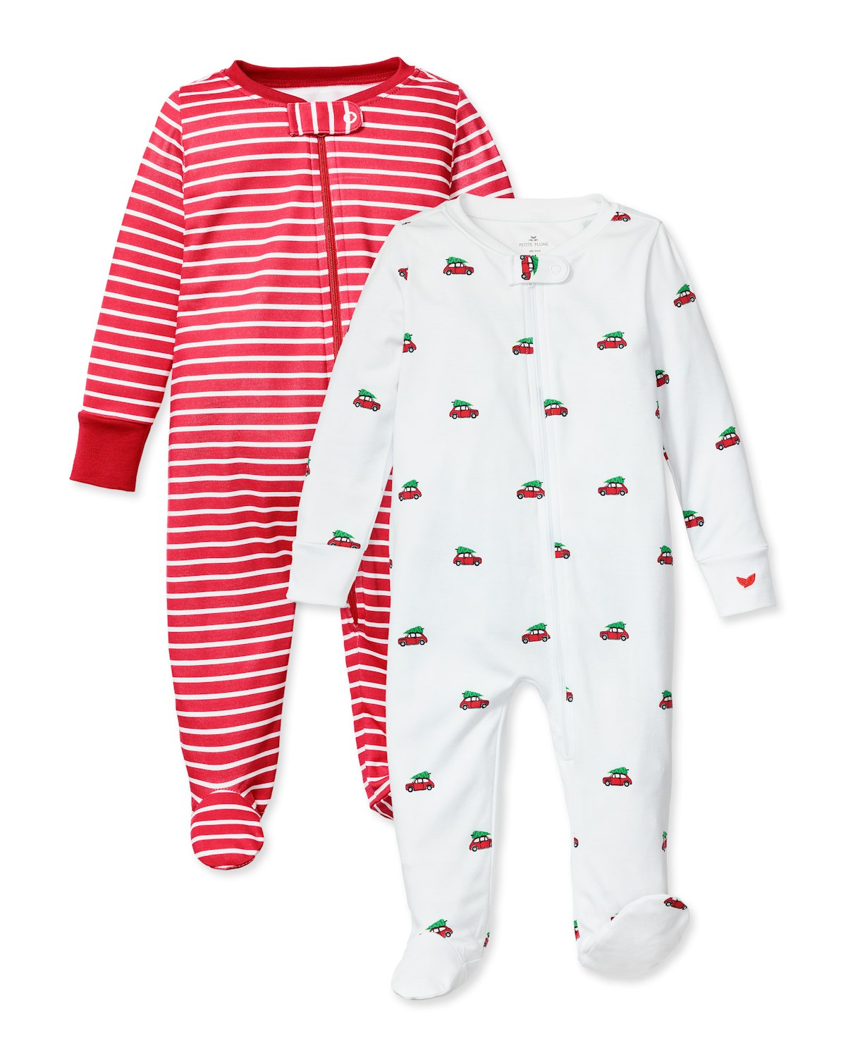 Petite Plumes Babys Holiday Pima Romper Duo includes two footed pajamas with convenient front zippers: one red and white striped with red cuffs and collar, and another showcasing festive prints of red and green trucks with a heart on the left sleeve. Perfect for luxurious sleepwear.