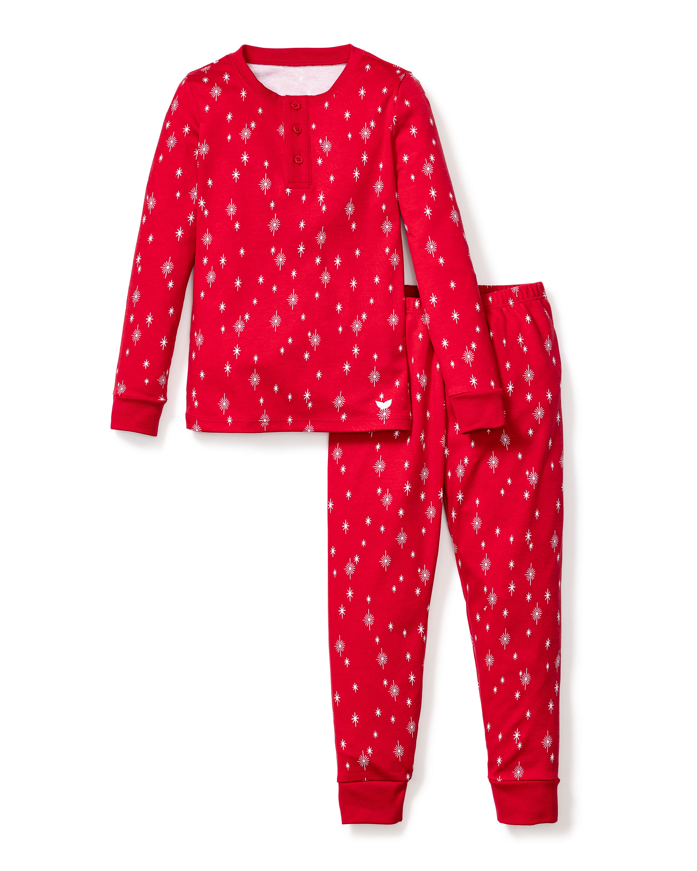 The Kids Pima Snug Fit Pajama Set in Starry Night by Petite Plume is a festive pima cotton sleepwear ensemble featuring a red long-sleeve top with white geometric patterns and front buttons, paired with elastic-waistband pants, offering both comfort and style.