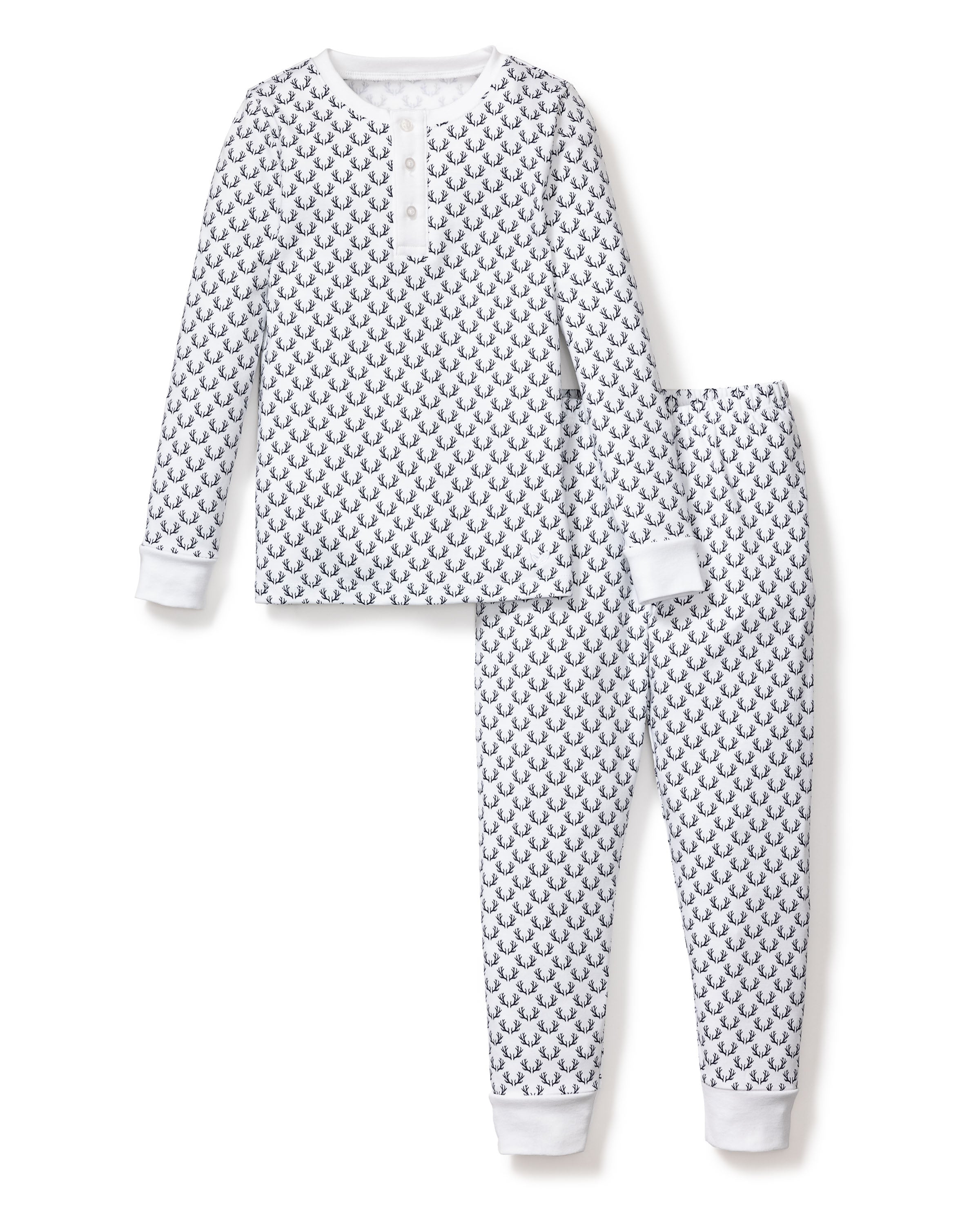 The Kids Pima Snug Fit Pajama Set by Petite Plume features a Nordic Antlers pattern on white. Made from luxurious Pima Cotton, this set includes a long sleeve top with a buttoned neckline and pants, both finished with ribbed cuffs for extra comfort.