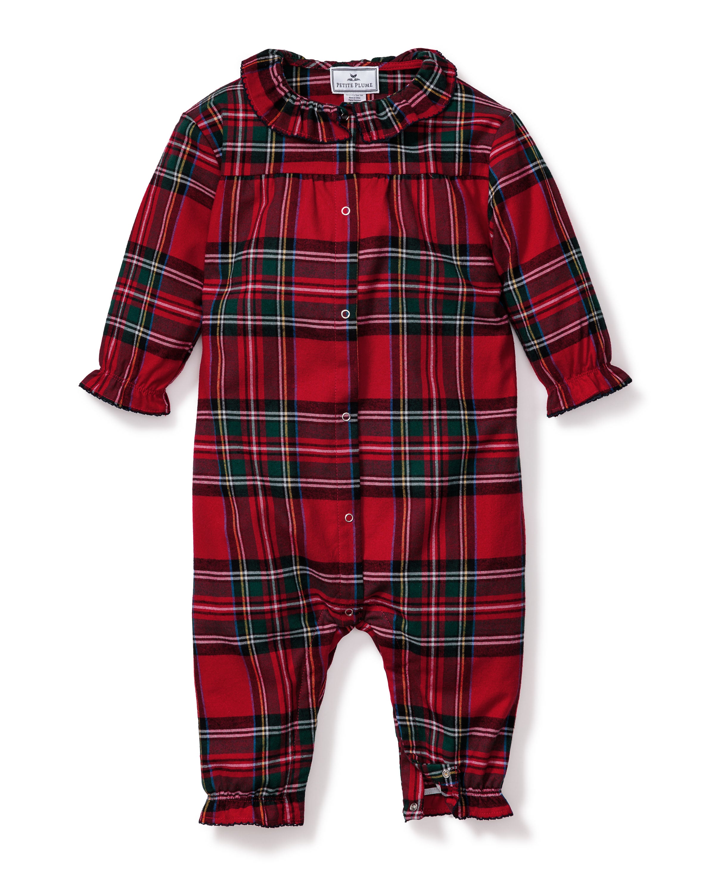 The Baby's Brushed Twill Madeline Romper in Imperial Tartan features long sleeves, a ruffled collar, snap buttons down the front, and gathered cuffs, all in a festive red, green, and white plaid.