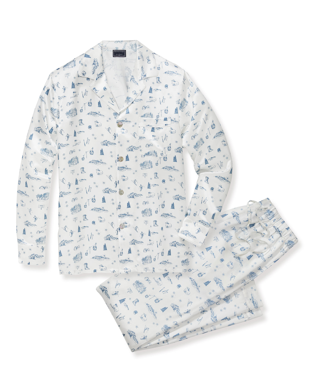 Petite Plume x White Elephant Men’s Silk Pajama Set in white, adorned with blue nautical-themed illustrations, featuring a long-sleeve button-up shirt and matching pants, both folded neatly on a white background.