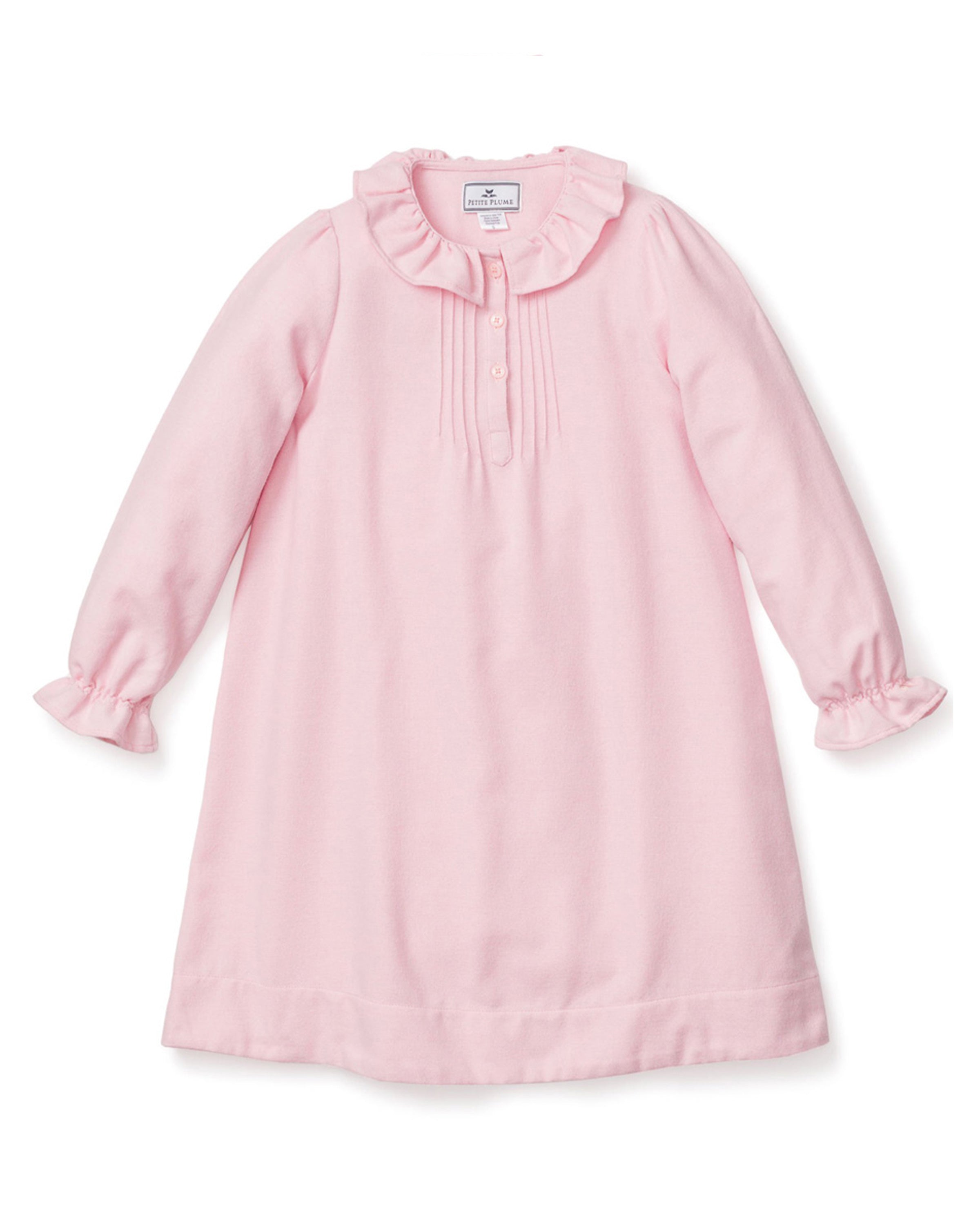 The Girls Flannel Victoria Nightgown by Petite Plume in light pink features long sleeves, a ruffled collar and cuffs, a button placket, and chest pleats. Its simple, elegant design is perfect for children.