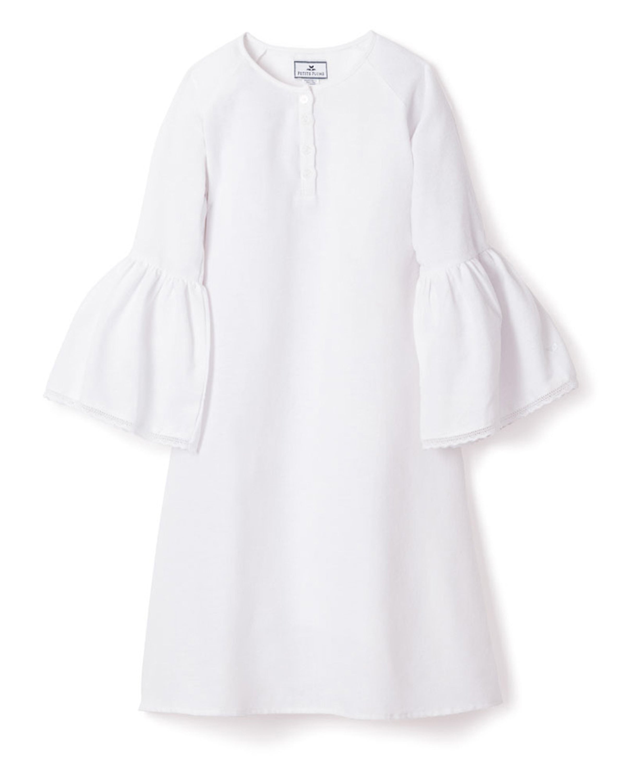 The Petite Plume Girls Flannel Seraphine Nightgown in White showcases an elegant, sleepwear-inspired design with a round neckline, knee-length cut, three-quarter bell sleeves, and a buttoned front placket.