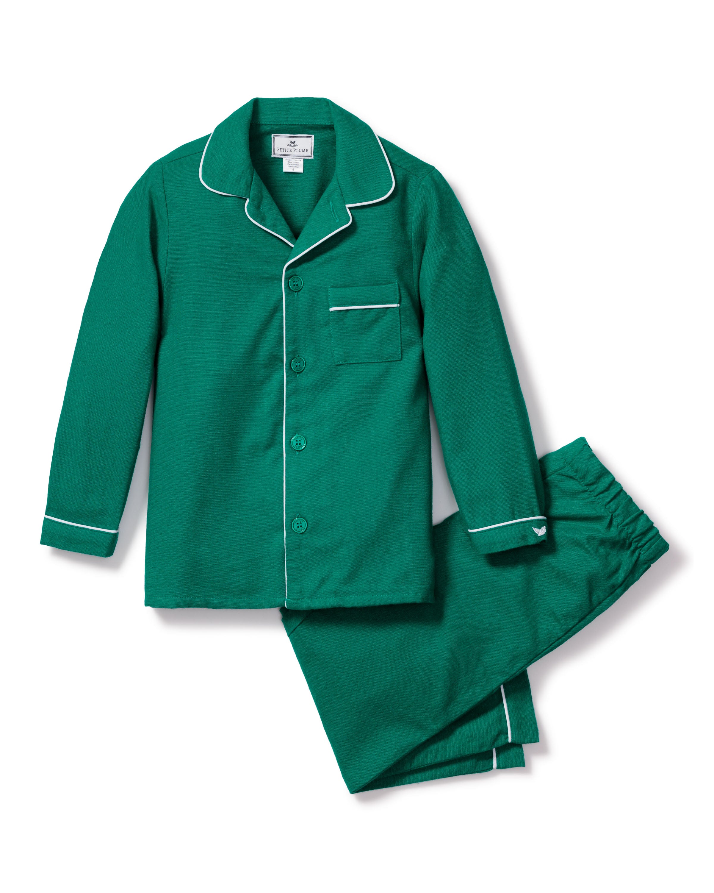The Kids Flannel Pajama Set in Forest Green by Petite Plume includes a button-up long-sleeve shirt with white piping and chest pocket, plus matching elastic-waist pants. Made from soft, flame-retardant fabric, they are ideal for nighttime.