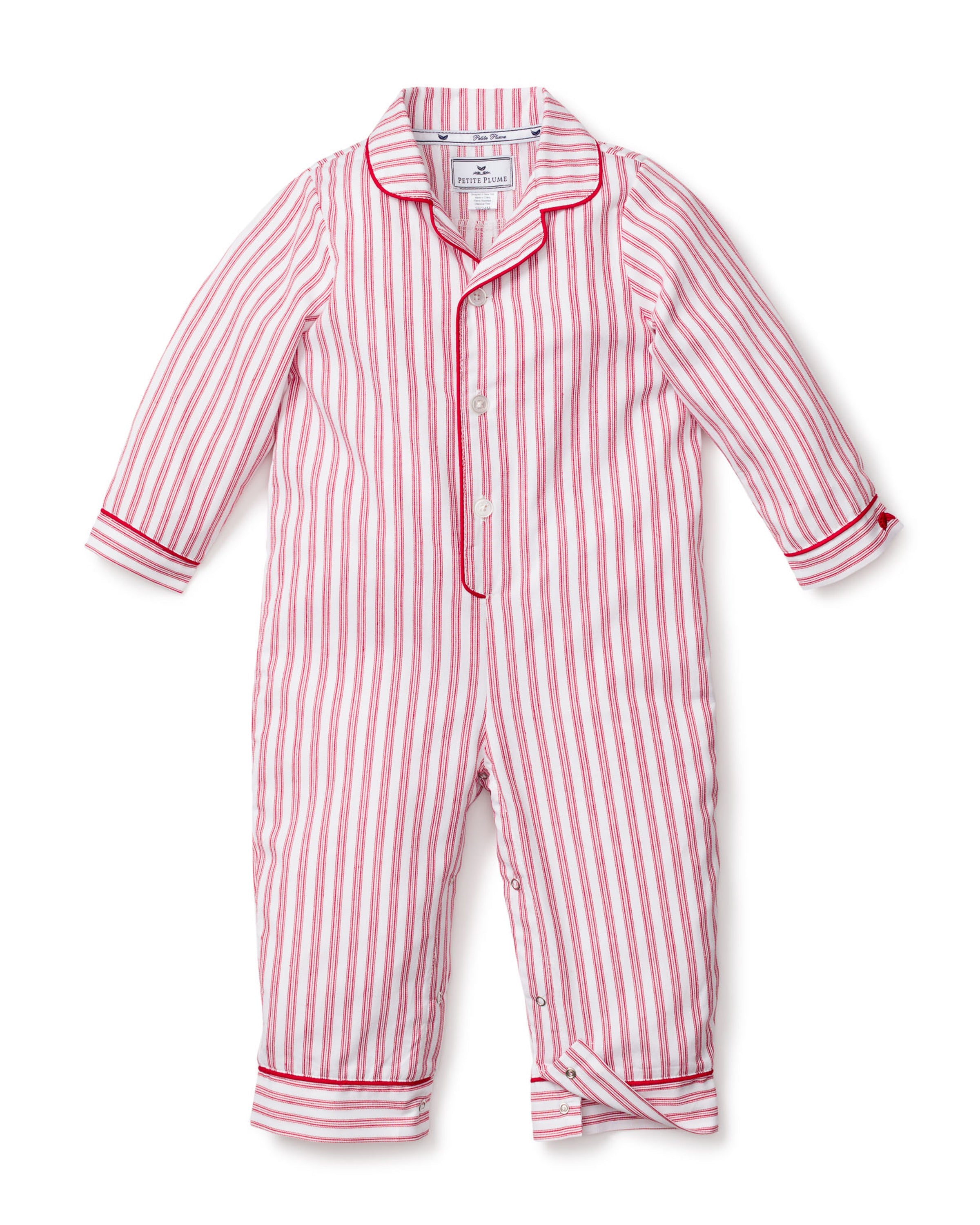 Petite Plumes Babys Twill Romper in Antique Red Ticking is a flame retardant, long-sleeved and legged sleepwear featuring red and white stripes. Made from brushed twill, it includes red piping, front buttons, a collar, and cuffed sleeves and pants for a cozy fit.