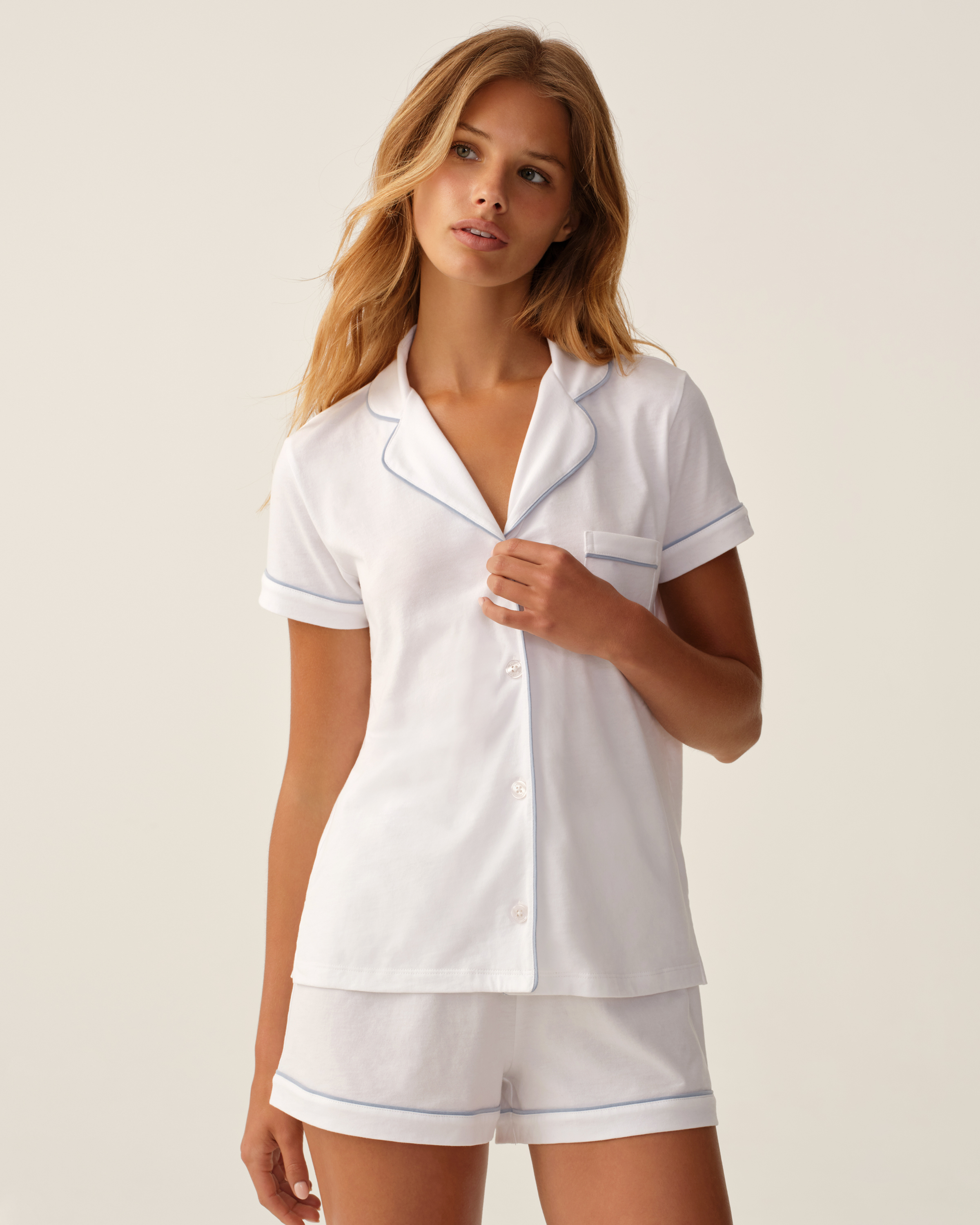 The Poppy Pima Short Set in White with Periwinkle Piping