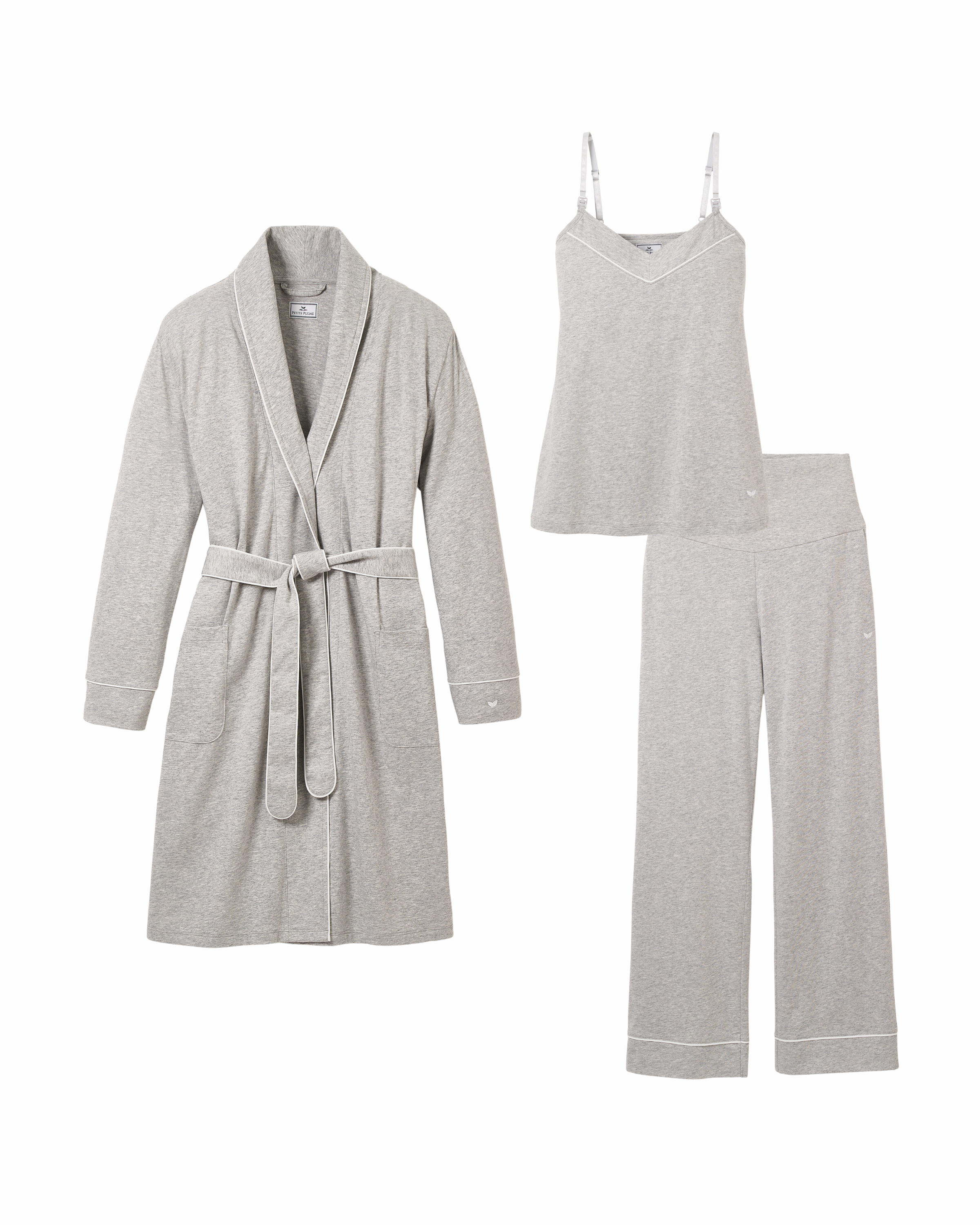 The Cozy Maternity Set in Light Heather Grey by Petite Plume offers luxurious relaxation with a white-trimmed robe and belt, sleeveless top with thin straps, and matching pants. Crafted from soft fabric, its a perfect gift on a white backdrop.