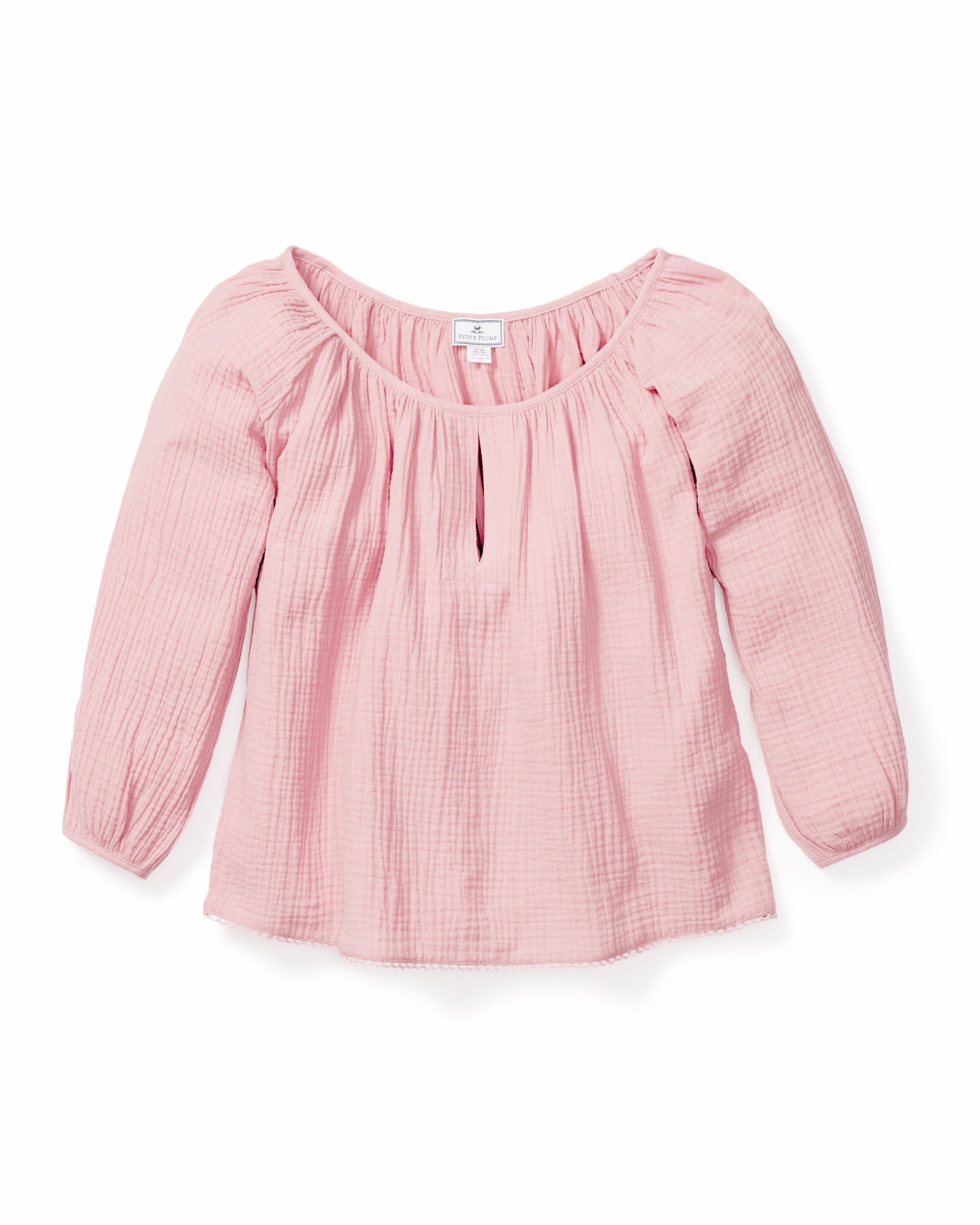 Discover the Womens Gauze Willow Scoopneck Top in Pink by Petite Plume—an elegant, long-sleeve blouse from our luxury Gauze Collection. Made from textured cotton gauze, it features a gathered neckline and a delicate keyhole opening for an airy, comfortable fit.