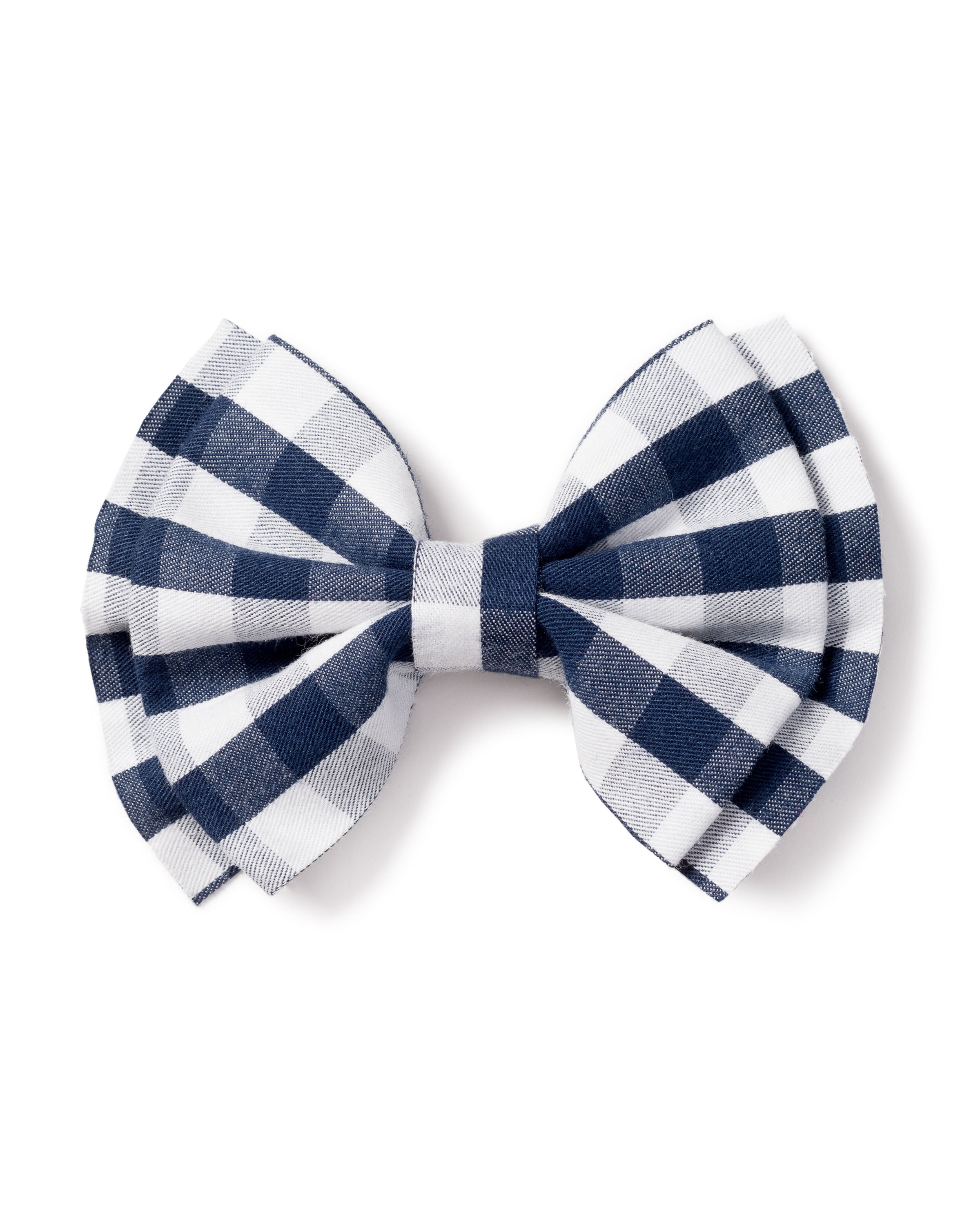 The Girls Hair Bows in Navy Gingham by Petite Plume, featuring a charming blue and white checkered design with evenly spaced squares, is set against a plain white background, showcasing its elegance and style.