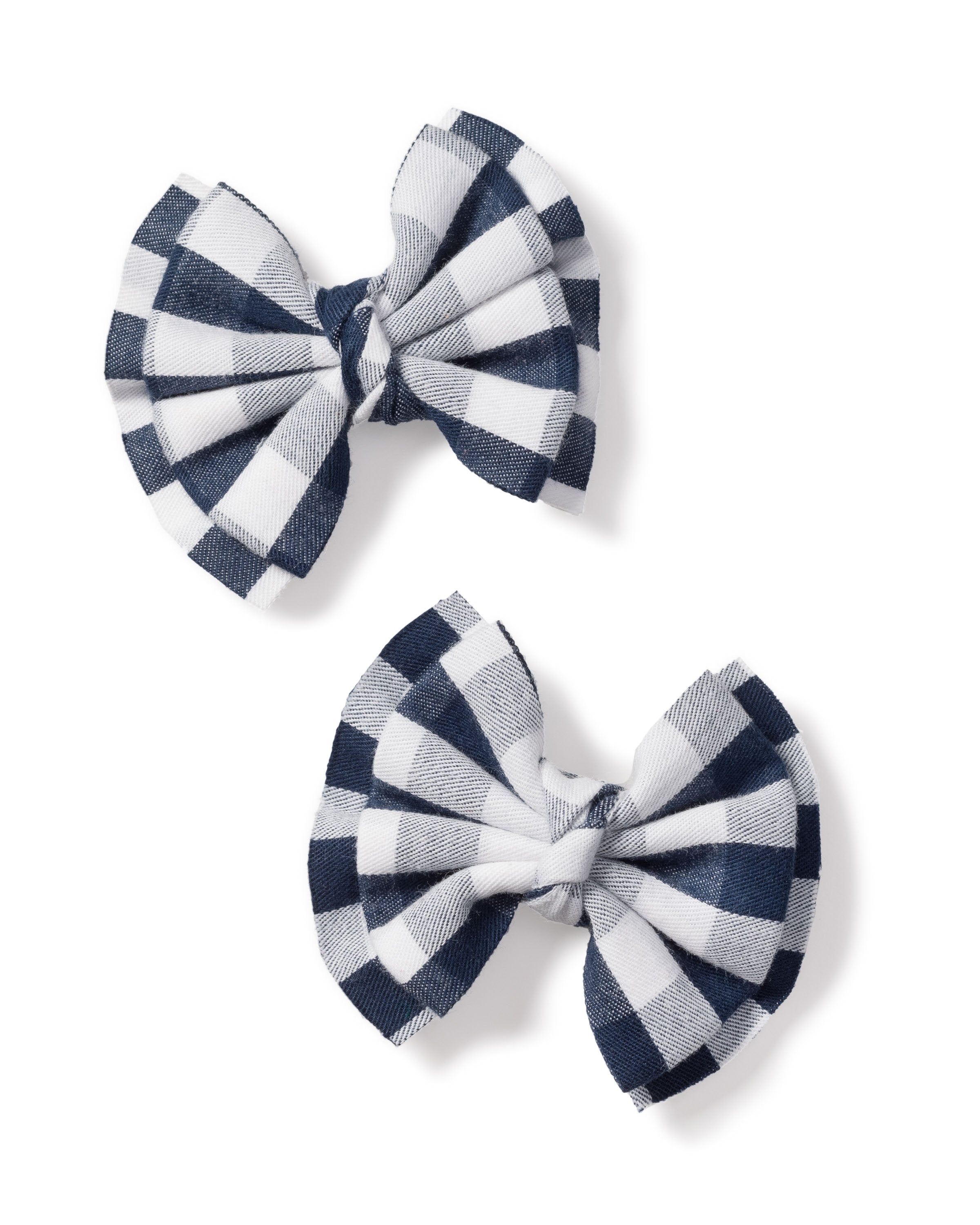 The Girls Hair Bows in Navy Gingham by Petite Plume feature two pleated fabric bows with a charming checkered pattern, perfect for girls hair accessories, shown side by side on a plain white background.