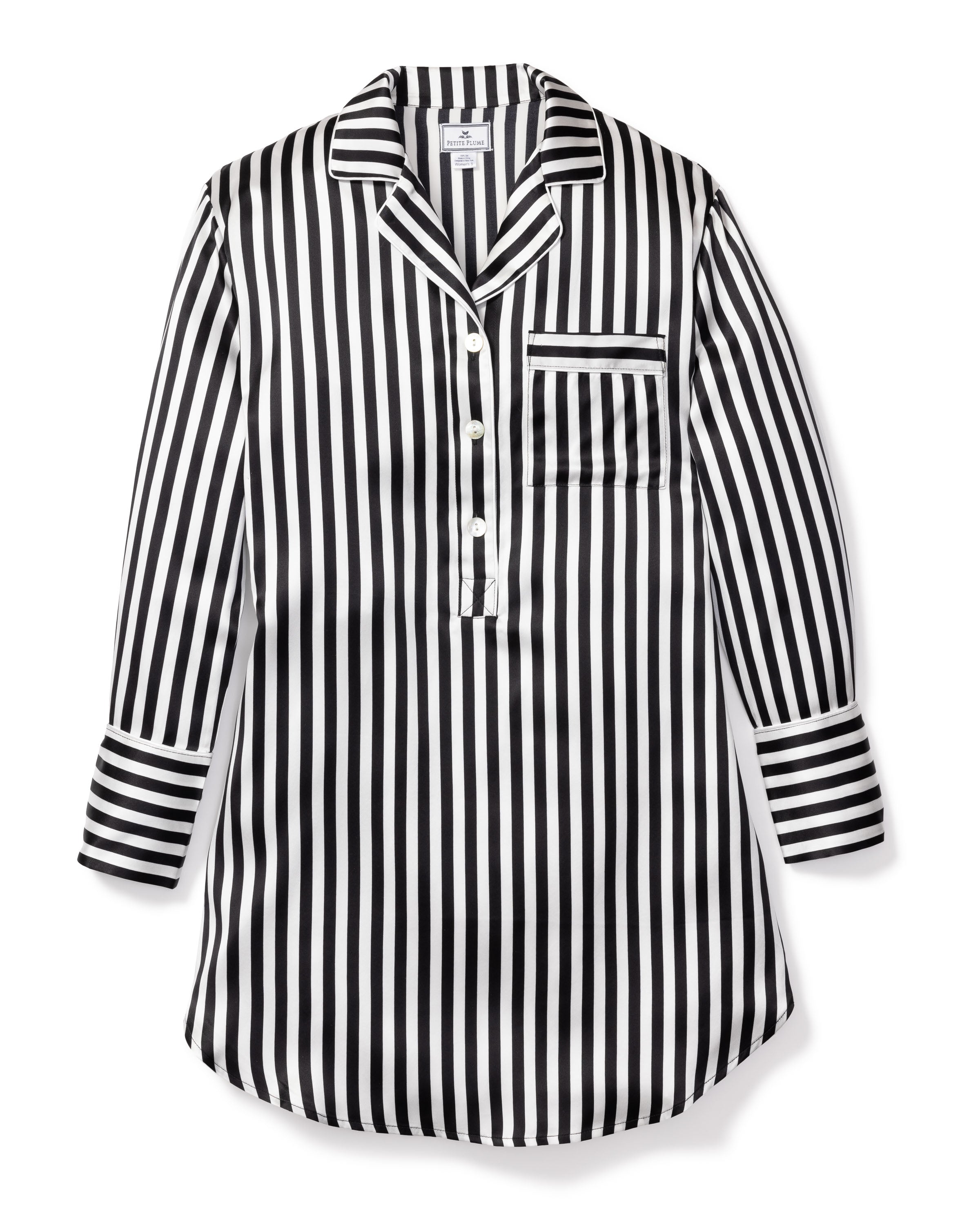 The Womens Silk Nightshirt in Black and White Bengal Stripe by Petite Plume, from the Cabaret Collection, features luxurious Mulberry silk, a collar, partial button placket, chest pocket, and cuffed sleeves. Laid flat on white background.