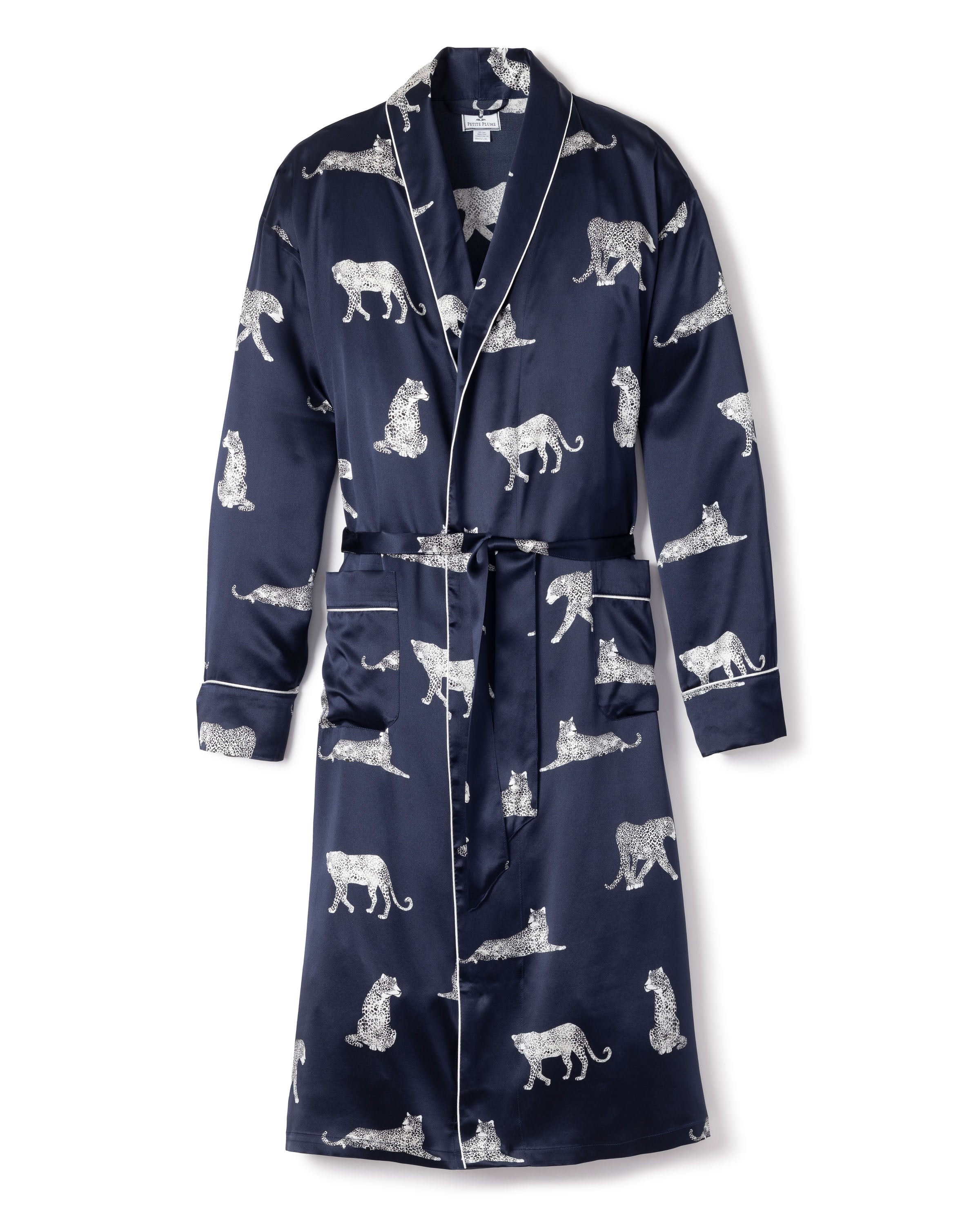 The Mens Silk Long Robe in Panthère de Luxe by Petite Plume is a luxurious lounging robe in navy Mulberry silk with white piping, featuring playful leopard patterns, two pockets, and a matching waist tie—ideal for stylish relaxation.
