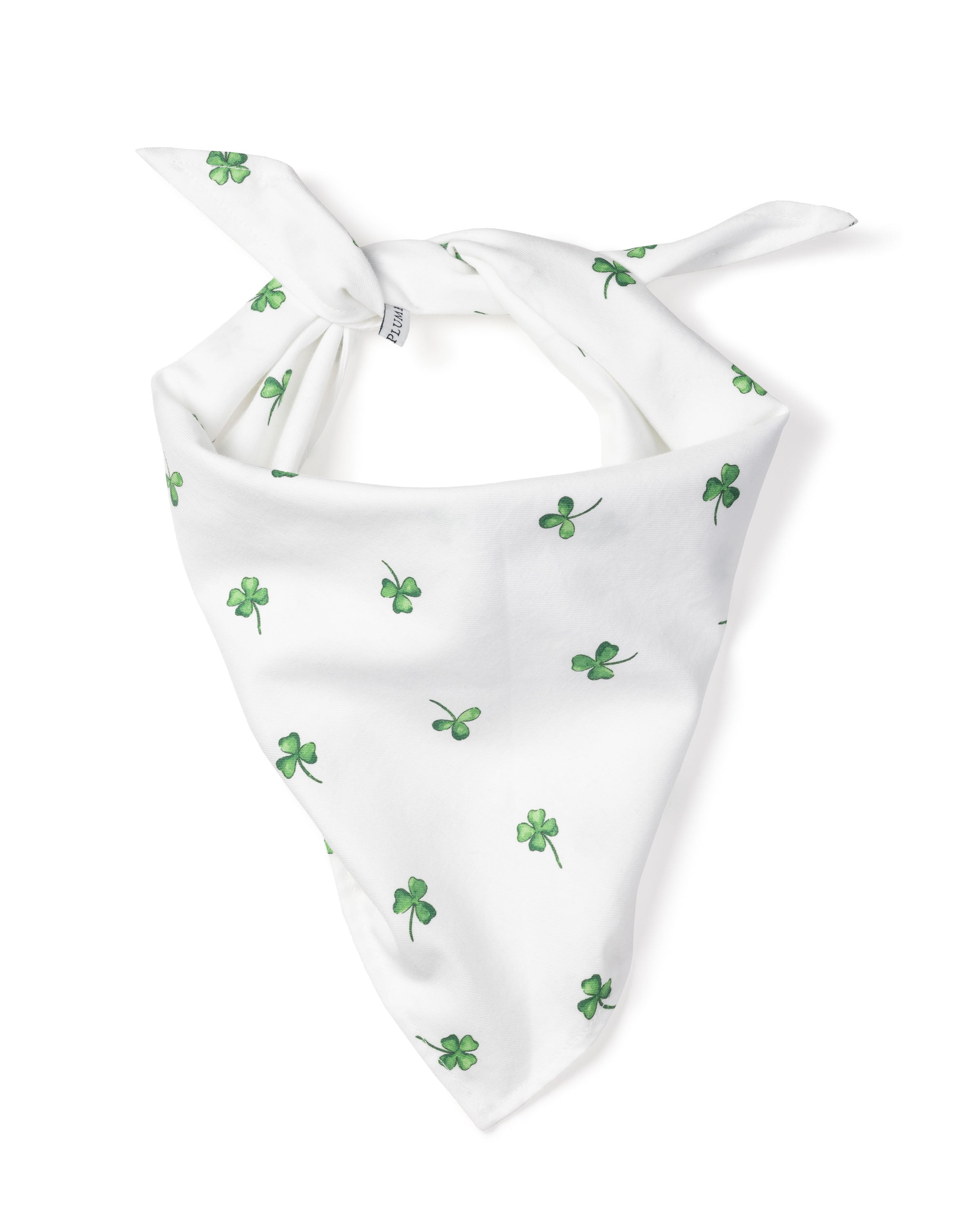The Petite Plume Dog Twill Bandana in Shamrocks features a charming green clover leaf pattern. Made from quality fabrics, it ties stylishly with ends pointing oppositely, adding a whimsical touch to your pups accessories.