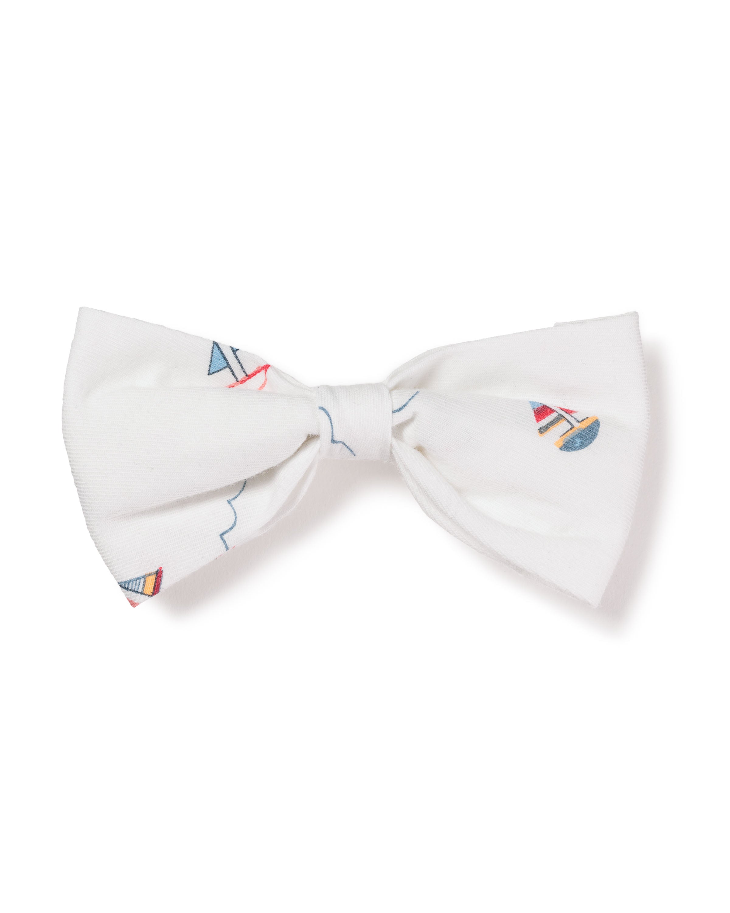 The Dog Twill Bow Tie in Bateau by Petite Plume features chic blue and red sailboat patterns on white, perfect for enhancing your dogs style.