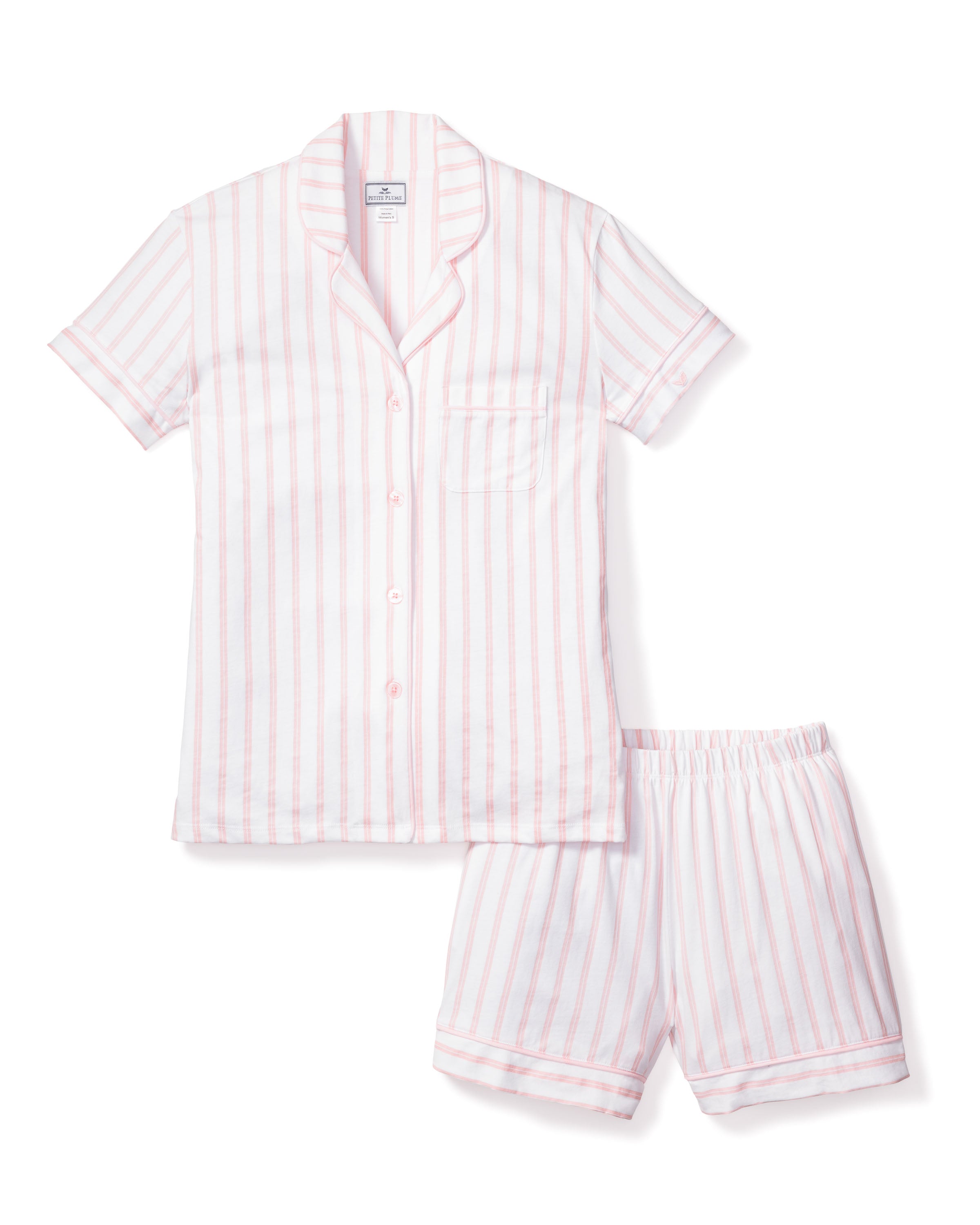 Petite Plumes Womens Pima Pajama Short Set in Pink Stripe offers a luxury bedtime experience. Made from Peruvian Pima cotton, it features a short-sleeve button-up shirt with a front pocket and matching shorts. The vertical stripes add elegance and unmatched comfort to your nightly routine.
