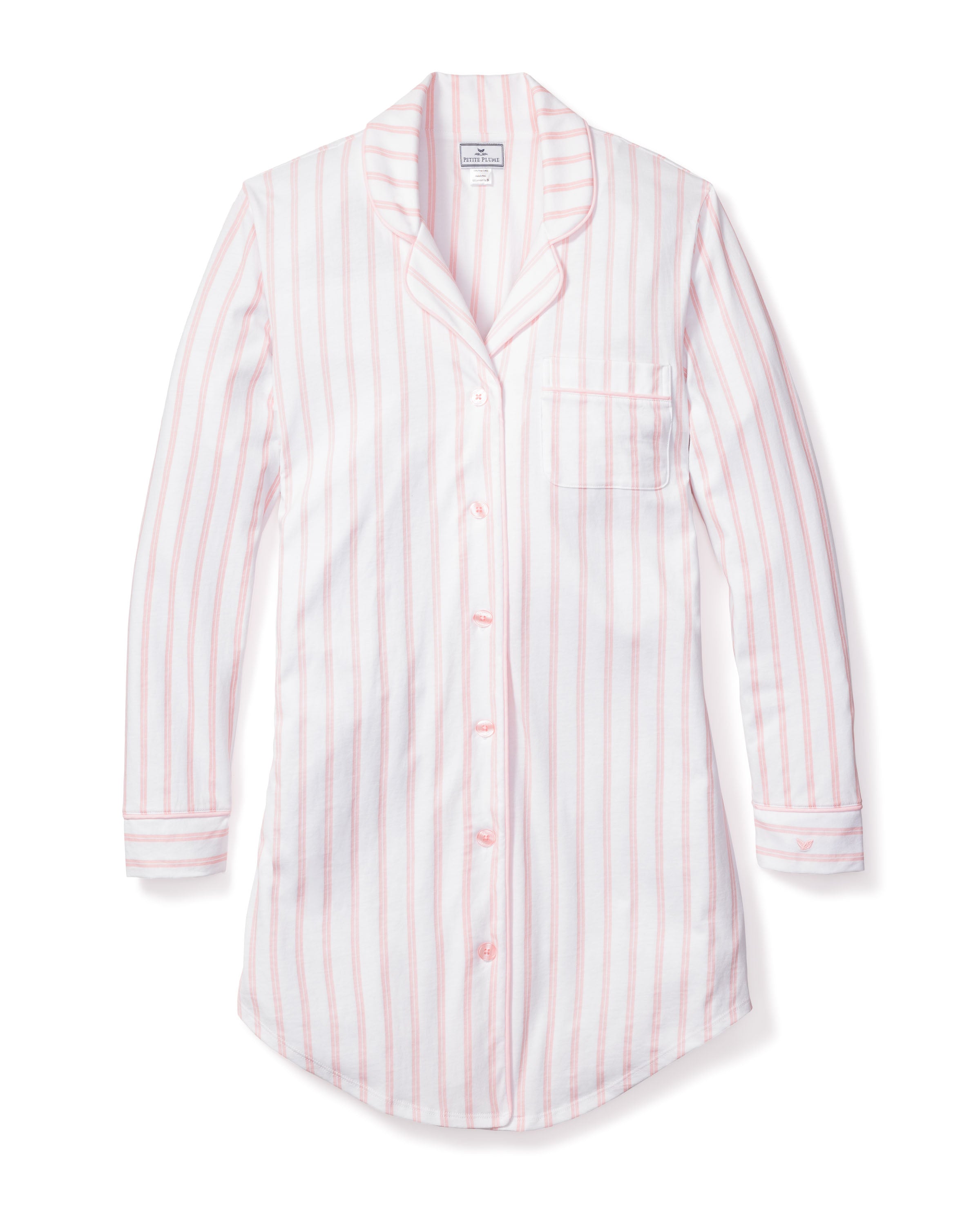 The Petite Plume Womens Pima Nightshirt in Pink Stripe is a luxurious long-sleeve, button-down sleepwear crafted from Peruvian Pima cotton. It features a collar, chest pocket, and minimal cuffs and hem, ensuring soft comfort perfect for lounging or sleeping.