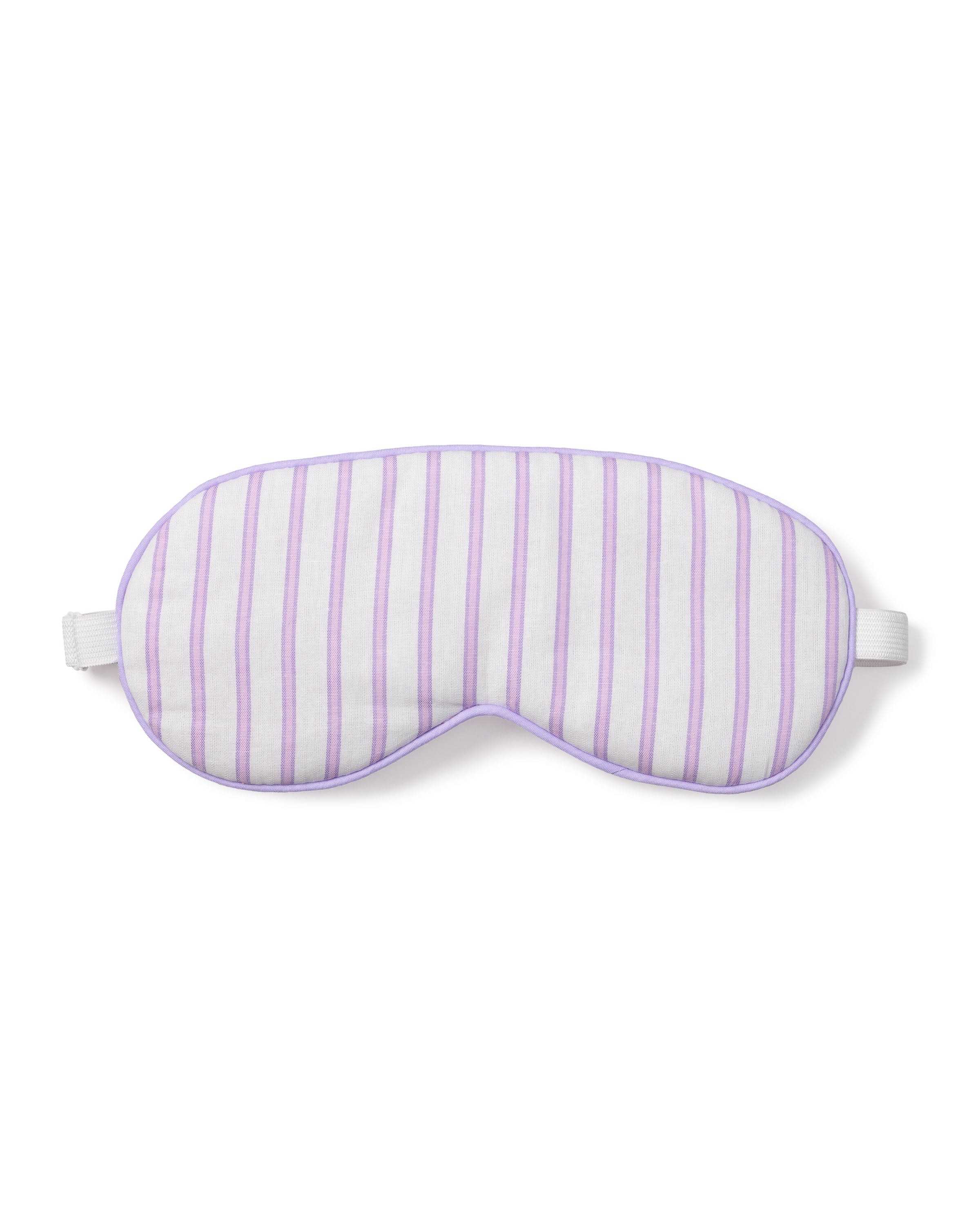 The Petite Plume Adults Twill Sleep Mask in Lavender French Ticking features vertical lavender stripes and a soft texture. Complete with a white elastic band, it provides luxurious comfort for rest and relaxation against a plain white background.