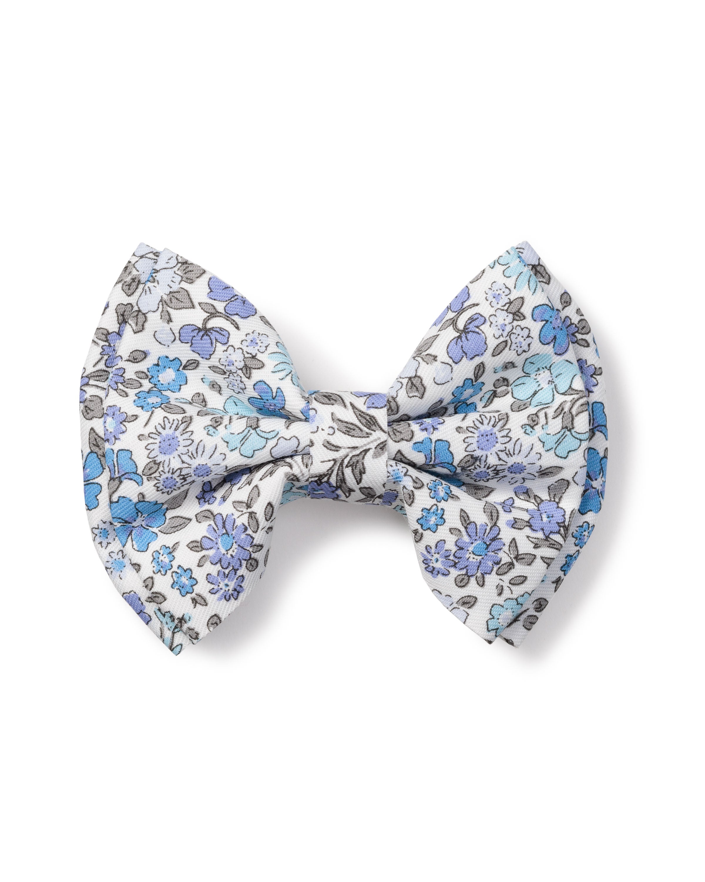 The Girls Twill Hair Bows in Fleur DAzur by Petite Plume is a charming accessory featuring a floral pattern in shades of blue and gray on a light background.