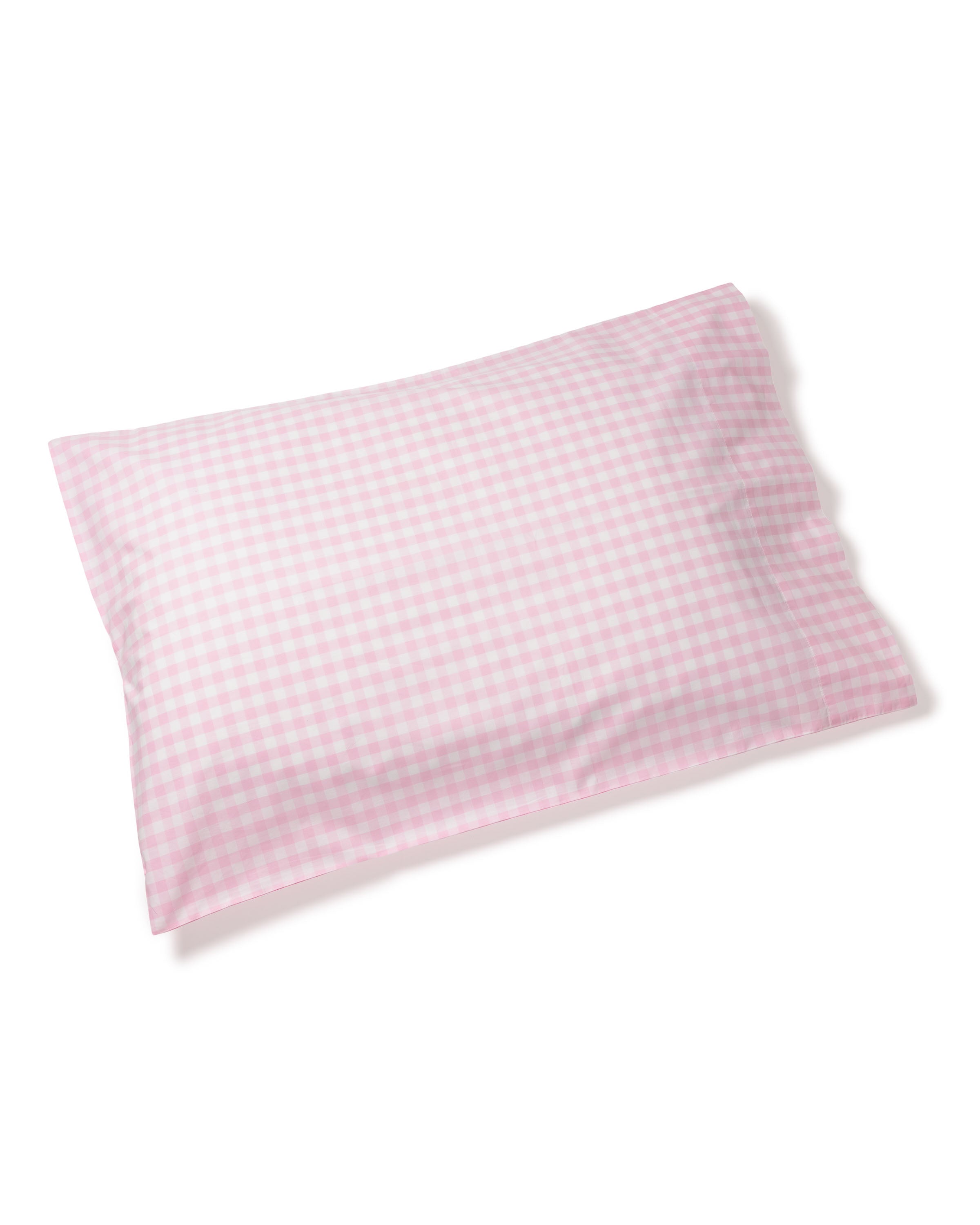 The Luxe Premium Cotton Pink Gingham Pillow by Petite Plume, featuring a layered pink and white checkered design on long-staple cotton, adds elegance with its small squares in a neat grid echoing luxury sheets, set against a plain white background for contrast.