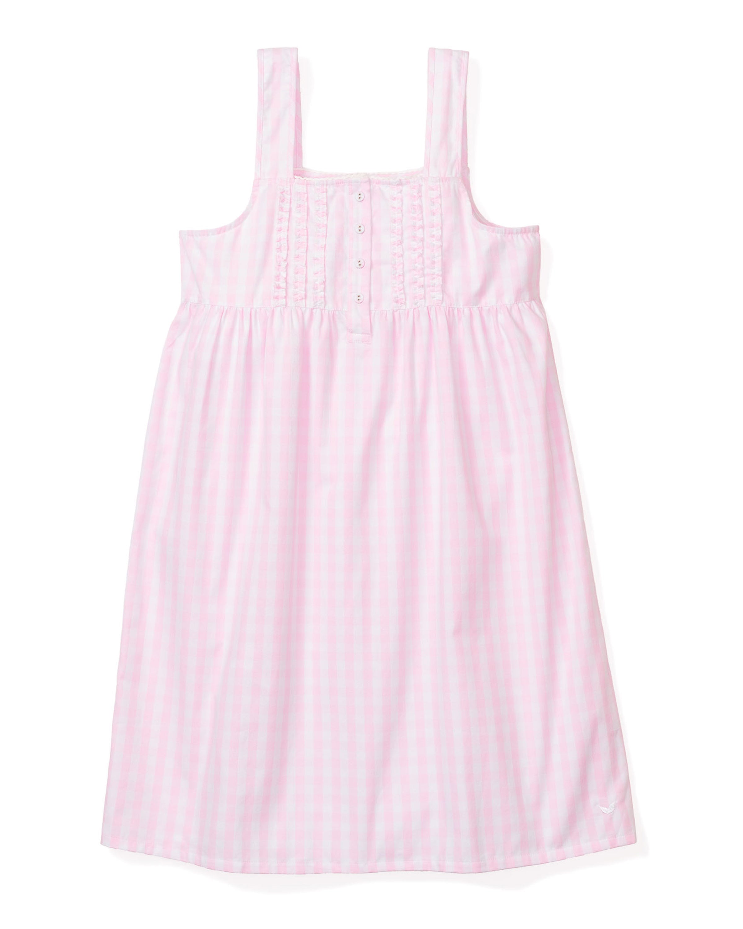 The Womens Twill Charlotte Nightgown in Pink Gingham by Petite Plume features wide shoulder straps, a pleated bodice, and front buttons. With a loose fit and soft texture, it is reminiscent of a luxurious cotton nightgown ideal for sleepwear enthusiasts.