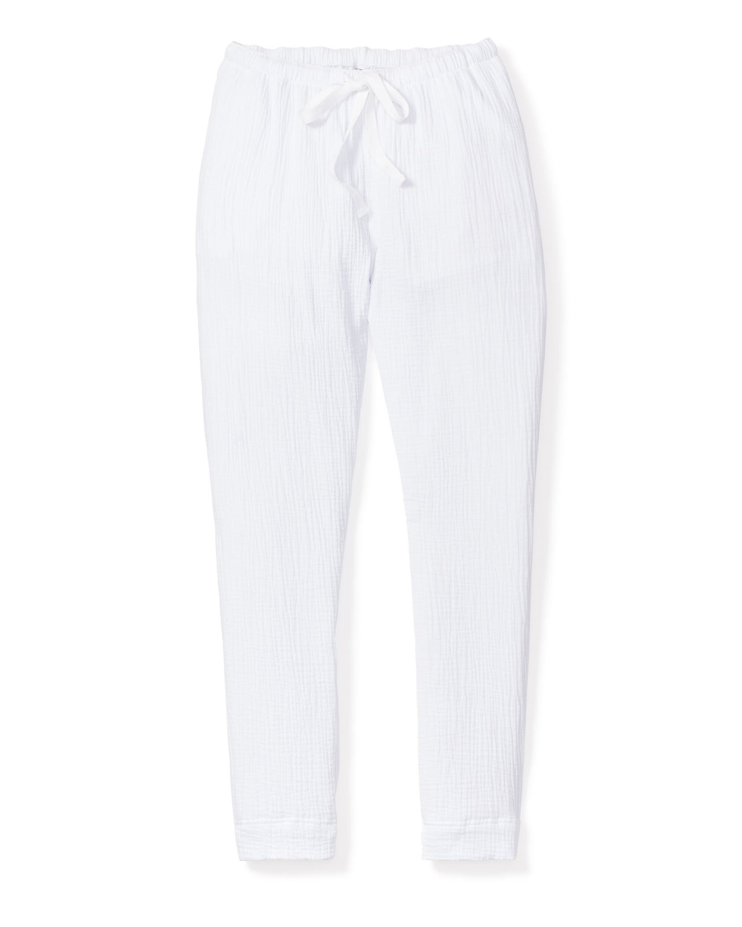 The Womens Gauze Drawstring Pants in White by Petite Plume feature a white, lightweight design with an elastic waistband and drawstring. Part of the luxury Gauze Collection, these pants offer a relaxed fit and are shown on a white background.